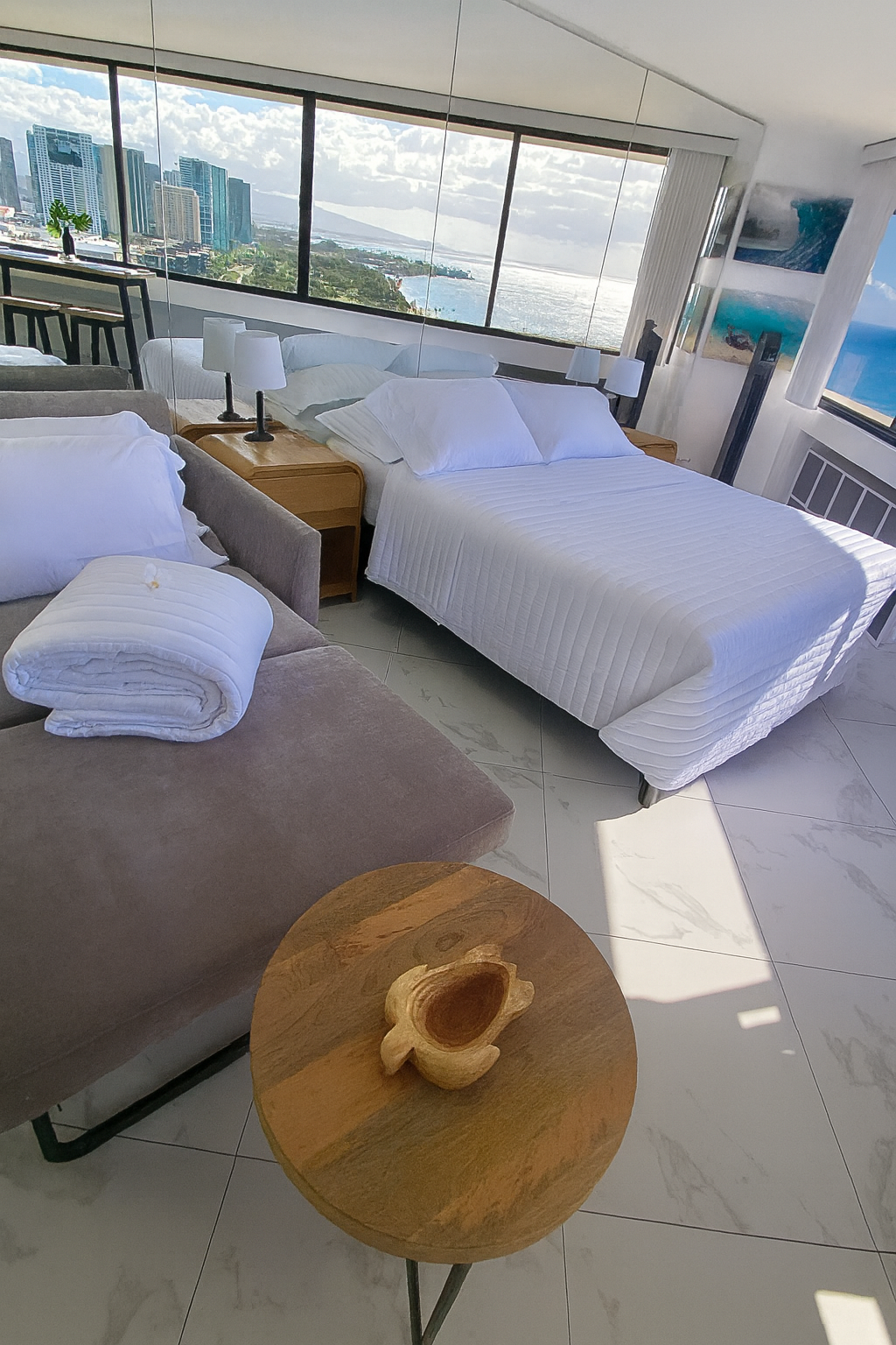 Wake up to sweeping ocean views and the golden light of Waikīkī mornings. This stylish studio offers a serene space with modern comfort, where every sunrise feels like a postcard from paradise.