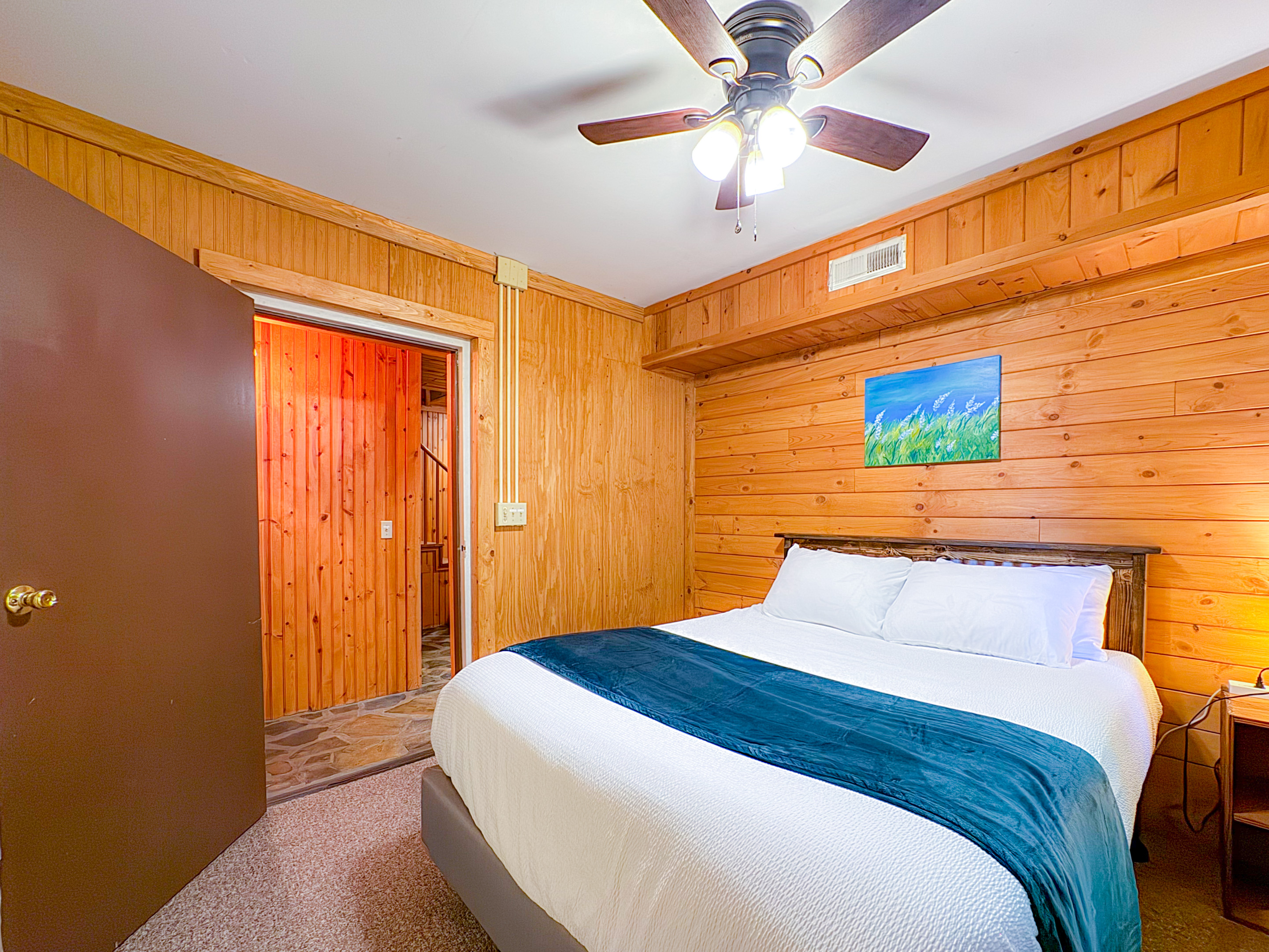ol gun range cabin lower bedroom with an en-suite bathroom