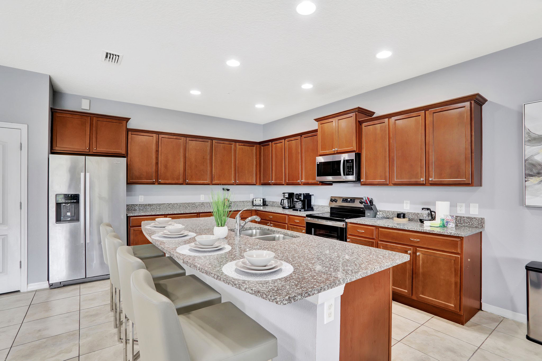 Breakfast Bar And Full Modern Kitchen