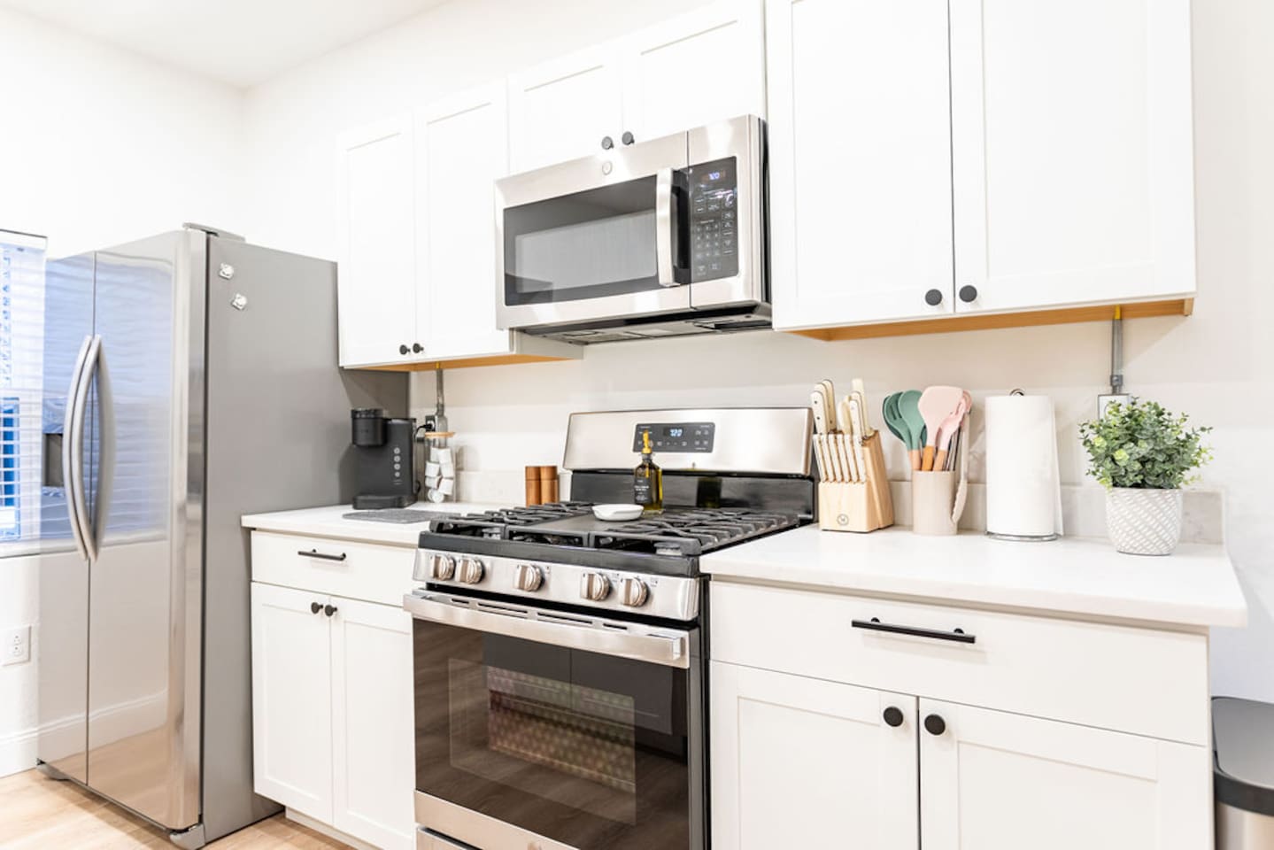 Fully stocked with essential kitchen wares, including cookware, utensils, and appliances for all your culinary needs.