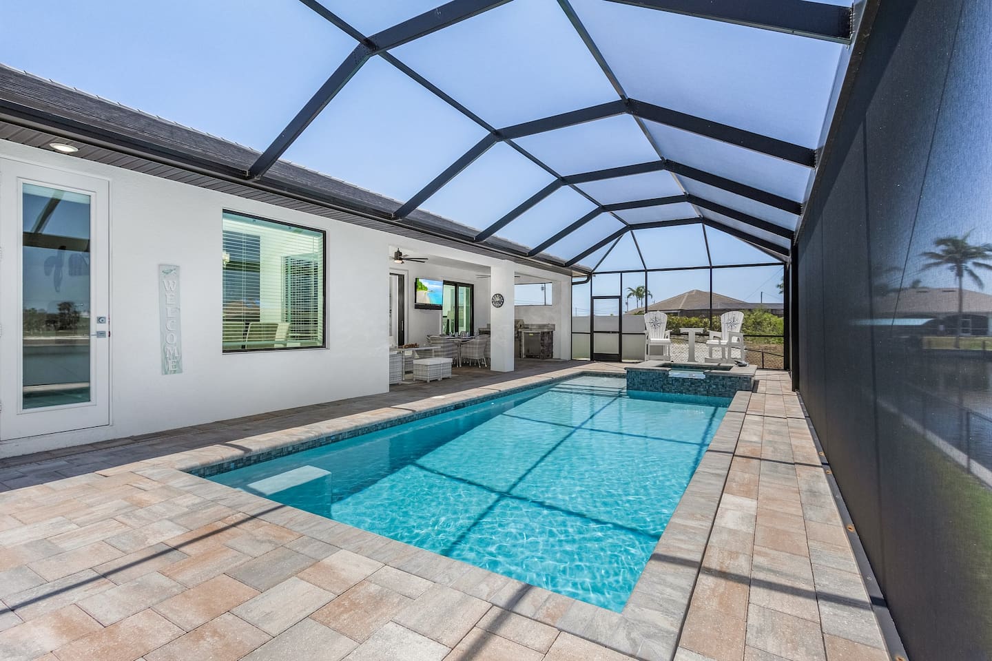 Dive into luxury with a crystal-clear saltwater pool and spa, all while enjoying breathtaking waterfront views!