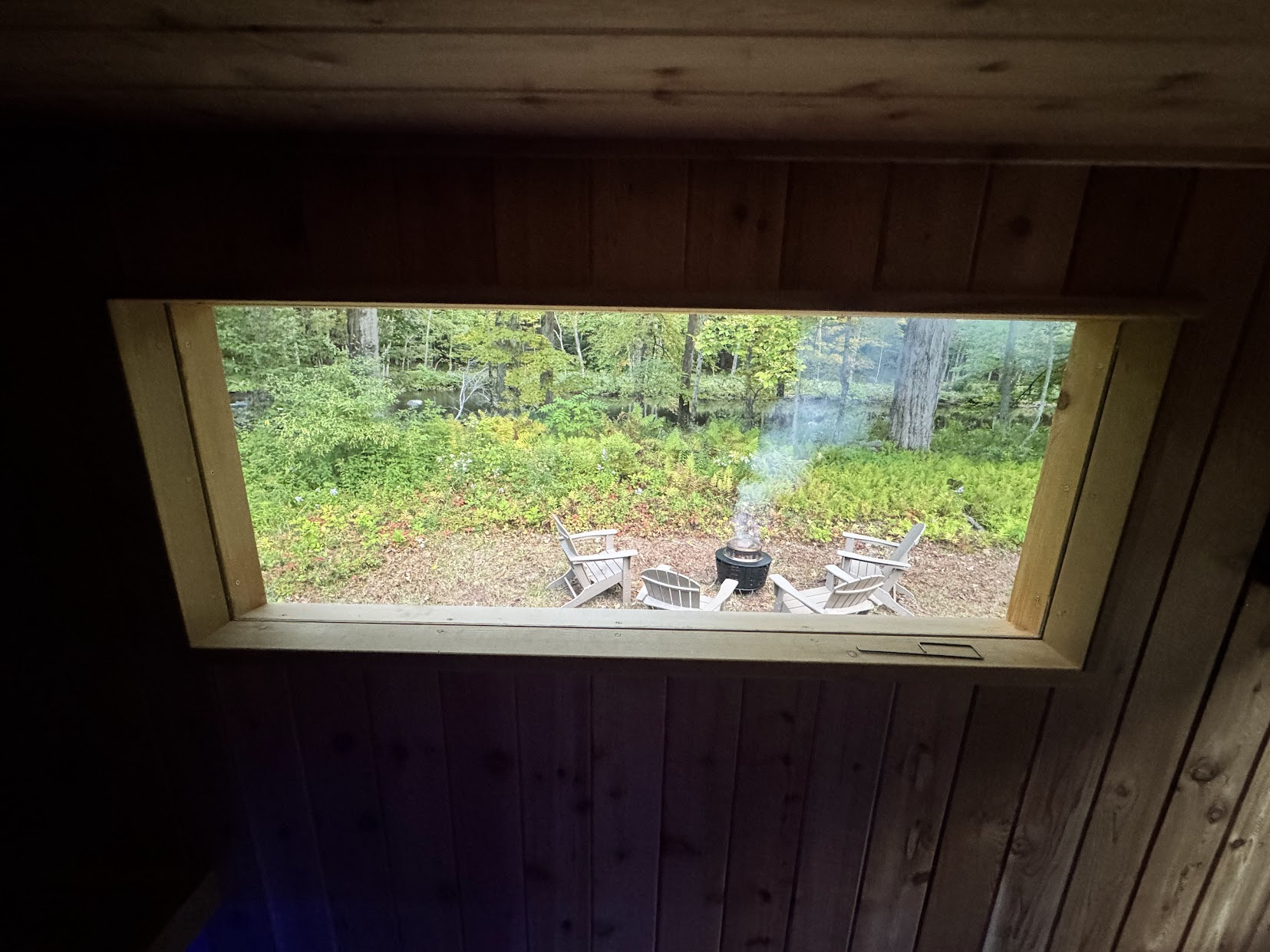 River and firepit views from the sauna.