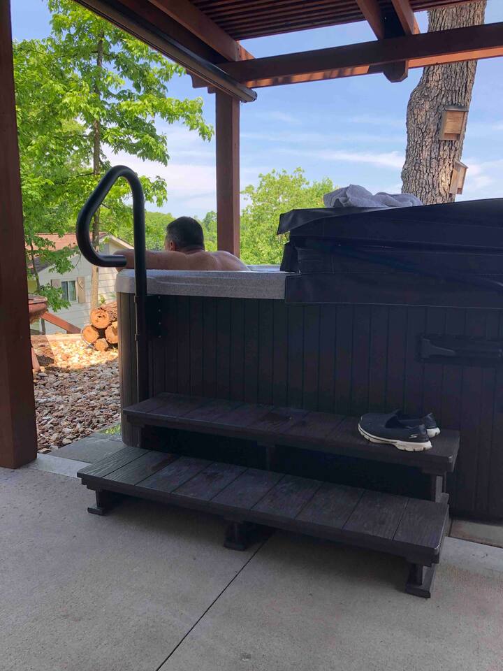 Safety rails and wide sets make it easy to enter and exit the hot tub. 
