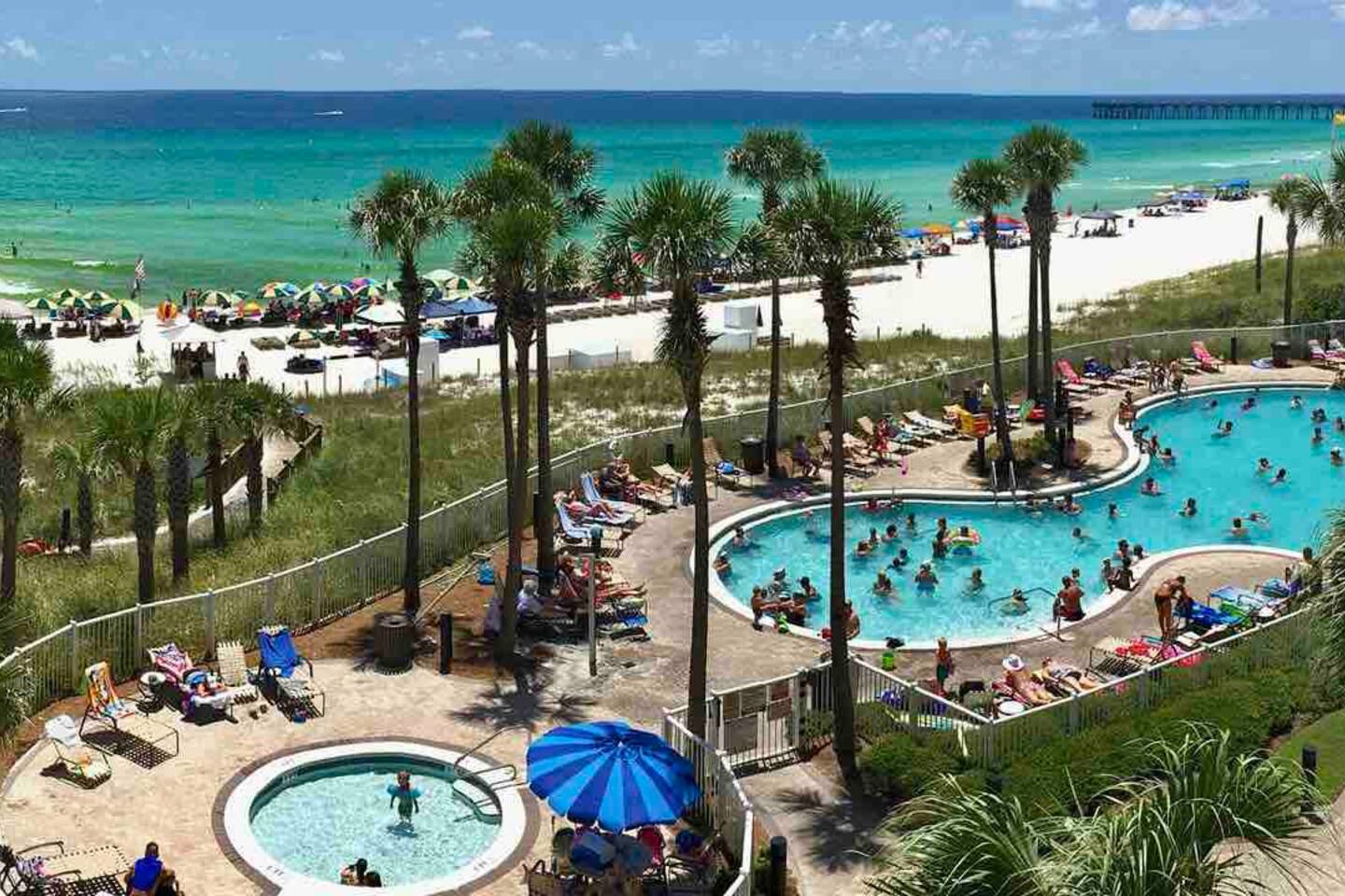 Beachfront resort with pool, Kiddy pool, hot tub and tiki bar on site! 