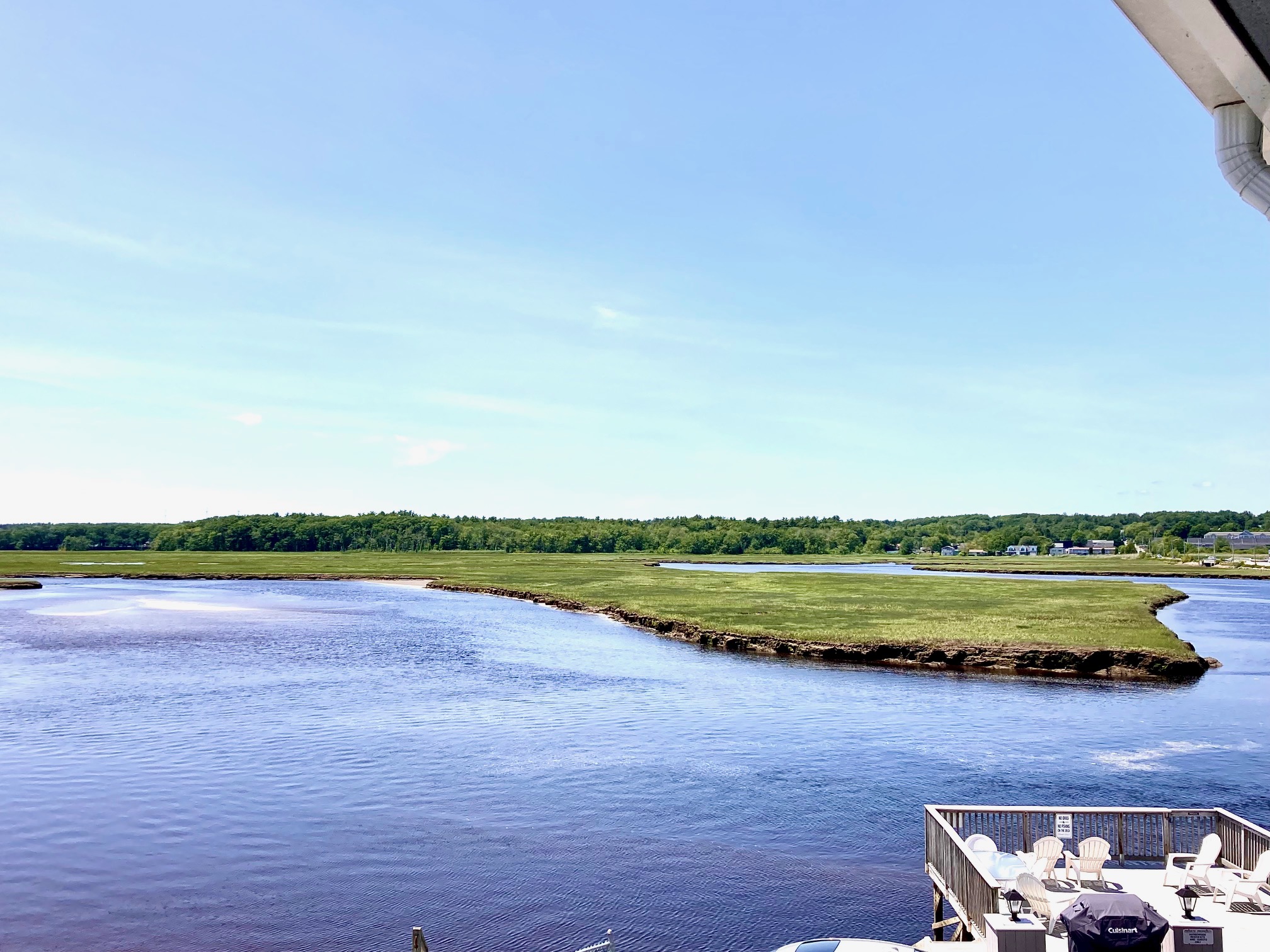 The beautiful view of the marsh from the common porch area, with Wells Beach just a 2 minute walk away