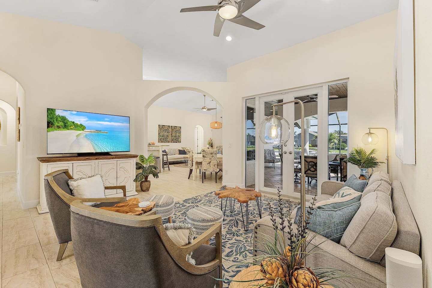 Spacious living area with cozy seating, ideal for movie nights.