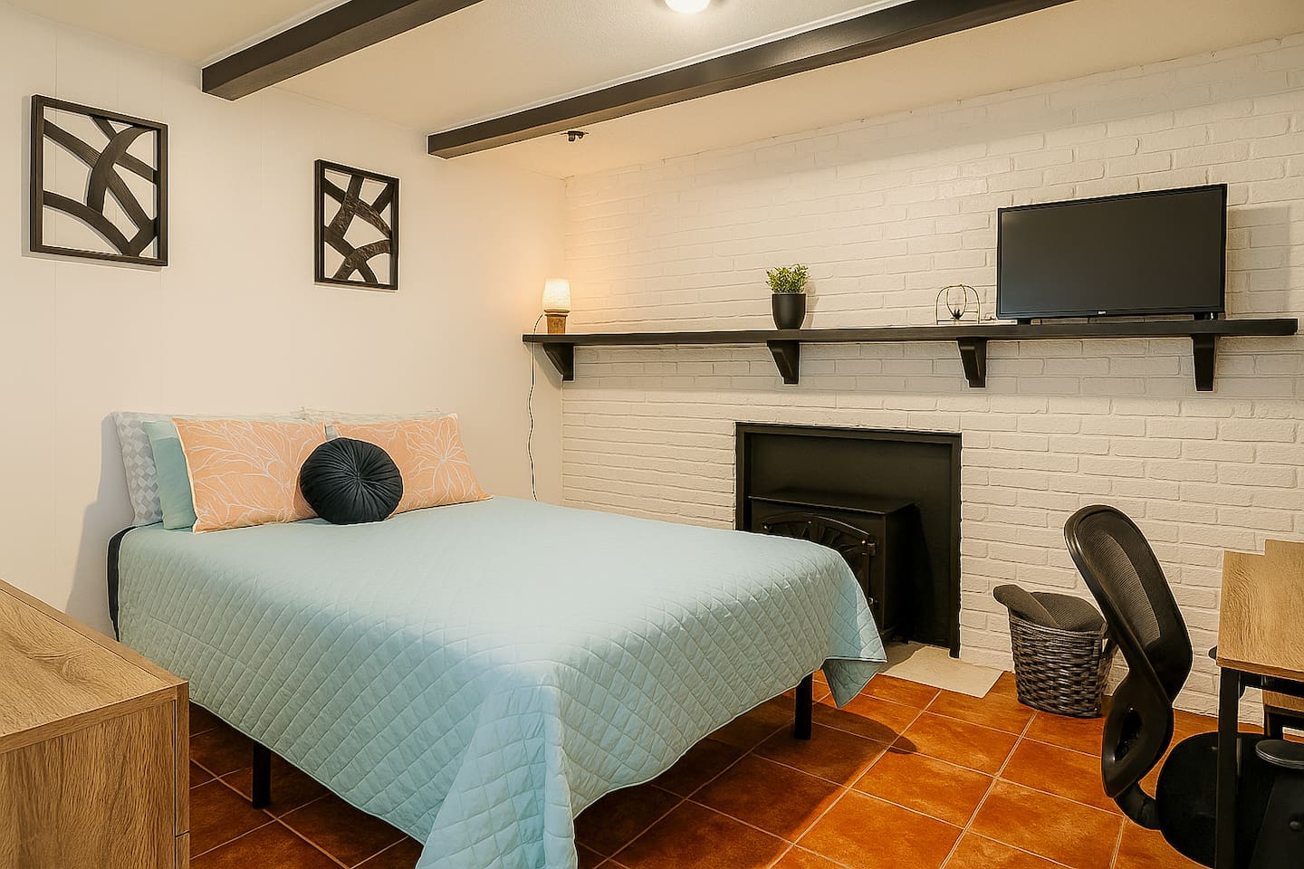 This versatile room features a full sized bed and desk — perfect for remote work, homework, or creative time. 