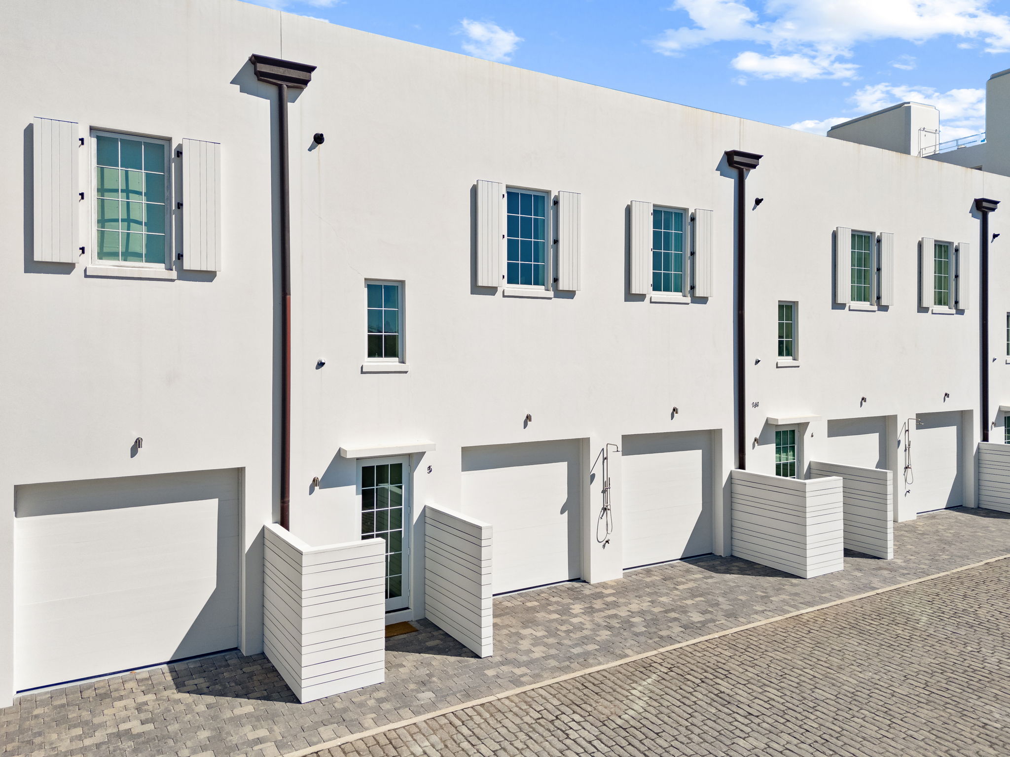 You can park on the rear parking pad behind the home.