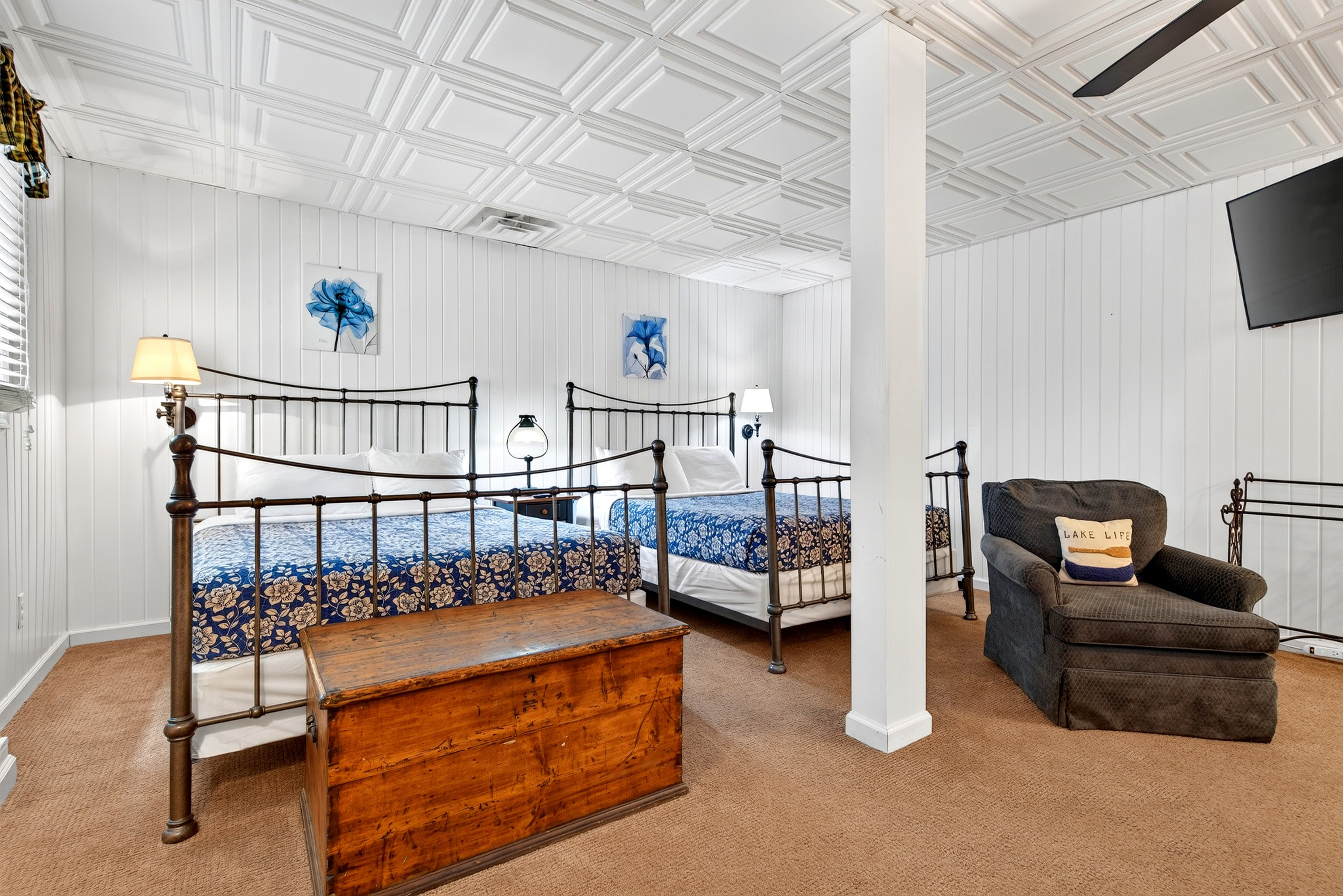 Downstairs basement guest room has a private entrance and two queen-size beds