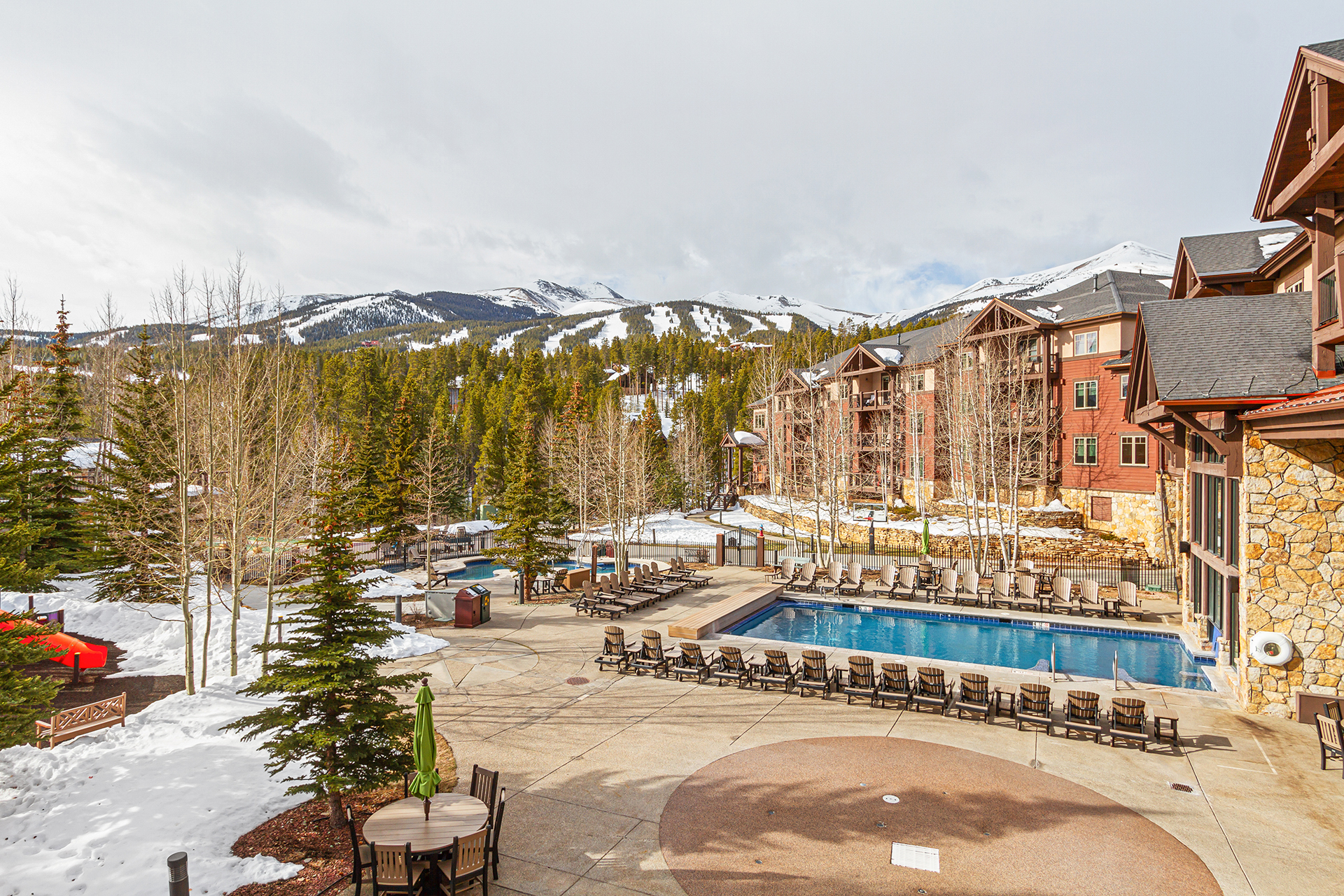 Outdoor heated pool with ample seating