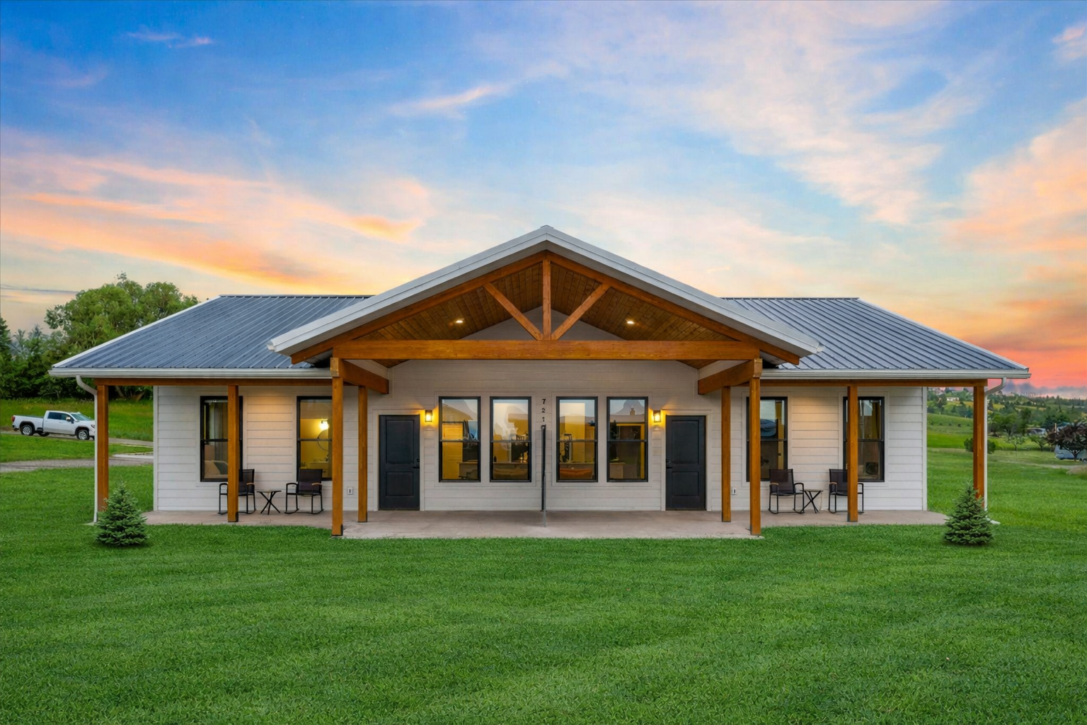 Modern duplex with large patios. (grass enhanced w/ AI)