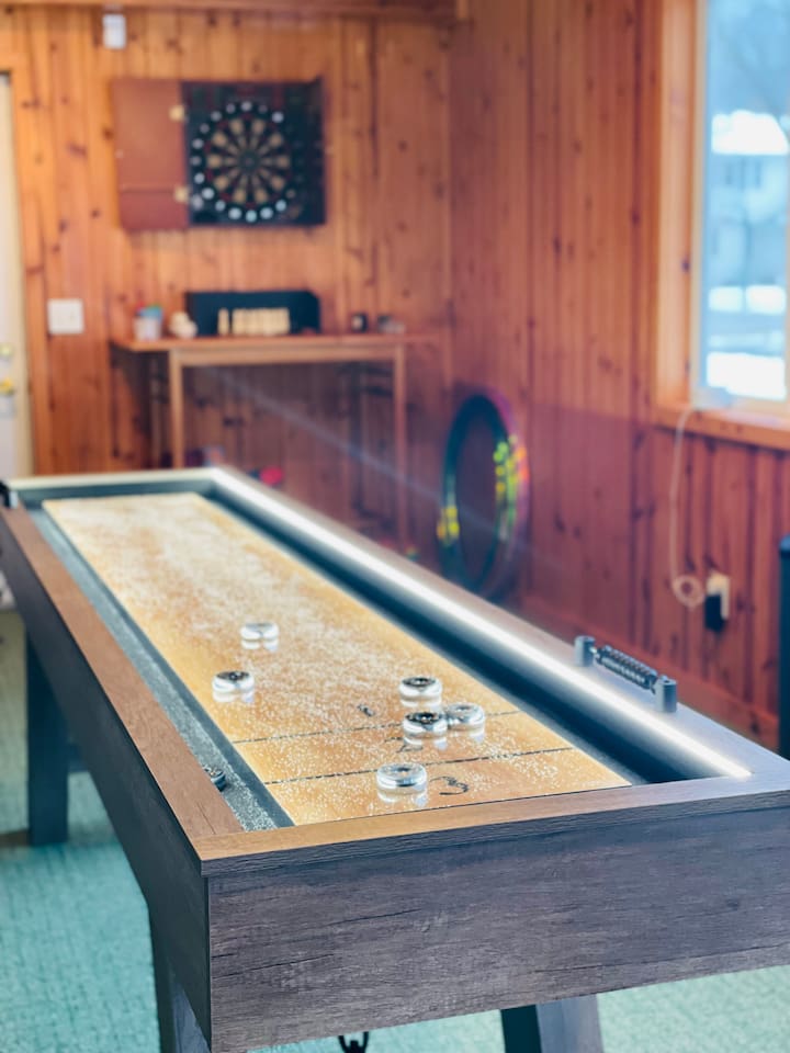 Shuffleboard table for fun indoor entertainment.