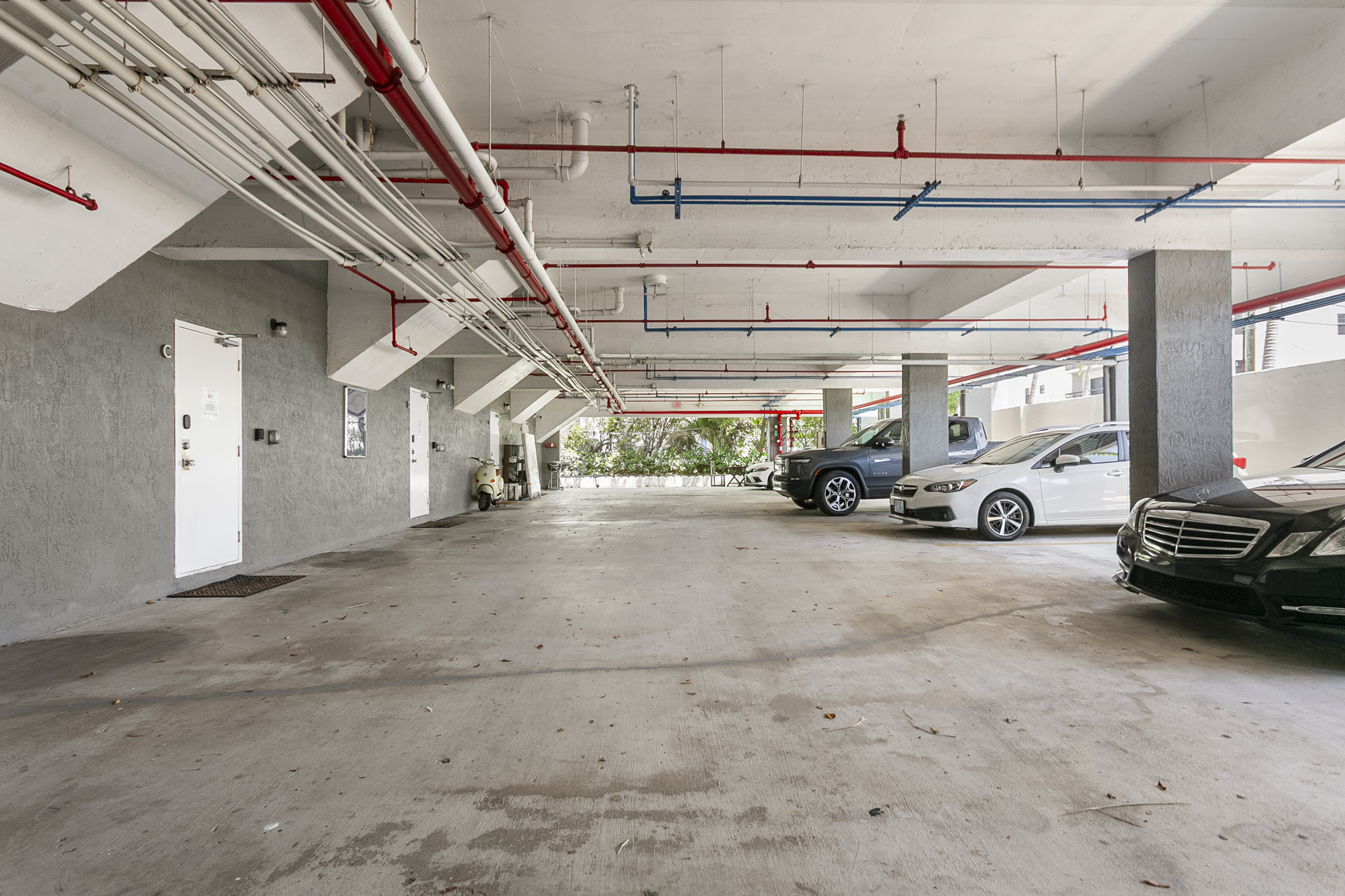 Drive in, park outside your front door — no spiral floors, no elevator from the garage. Open the garage door, park, walk a few steps to your unit