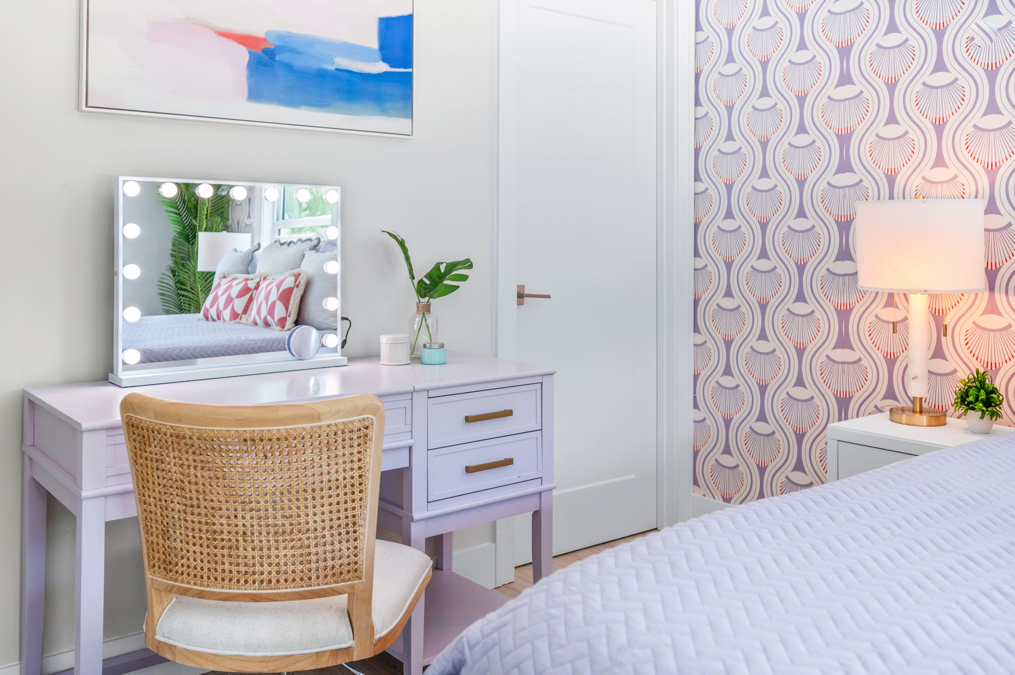 The downstairs master comes with its own private full bathroom, plus a stylish desk area featuring a mirror surrounded by bright bulbs—perfect for a makeup station or a cozy spot to get some work done. Comfort and convenience, all in one!