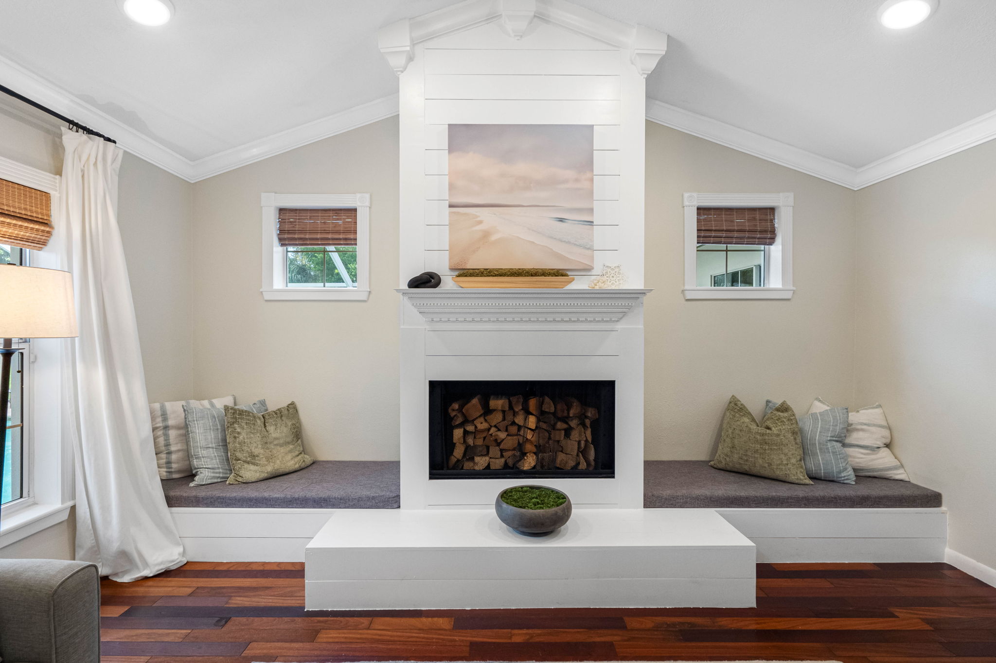 Plush sofas and armchairs invite you to settle in, while thoughtful details like the wood coffee table add rustic warmth.