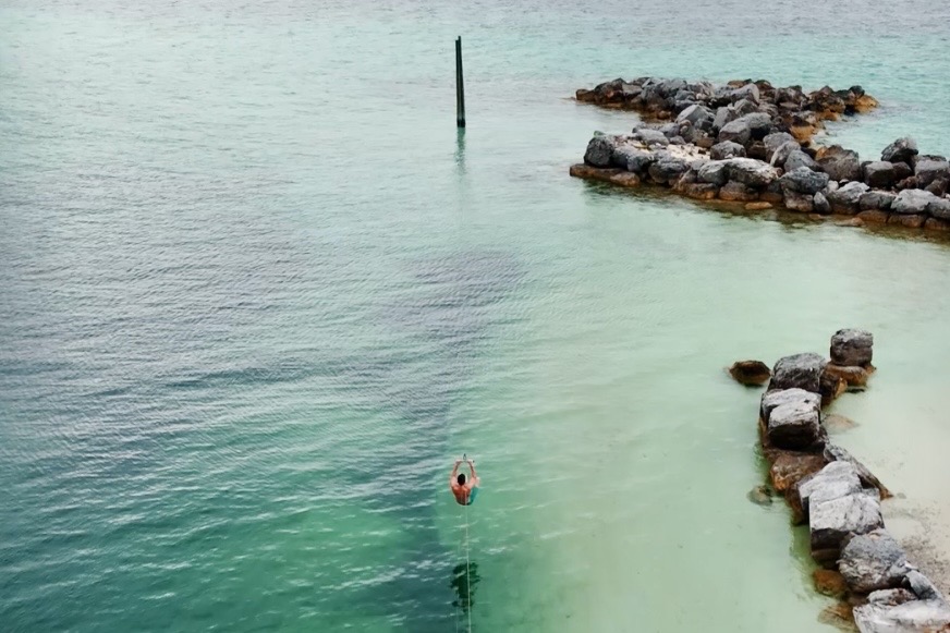 From natural shoreline views to ziplining over the water, every detail of this setting feels immersive, private, and unforgettable.