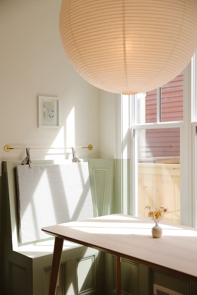 The breakfast nook may be our favorite part of the house. Featuring custom cushions and the oversized rice paper lantern from Hay. It's a great place to share a coffee or take a meeting.