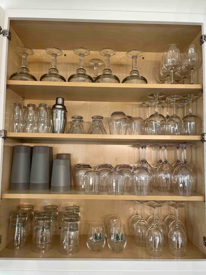 Plenty of glasses - wine, stemless champagne, martini and margarita glasses. 