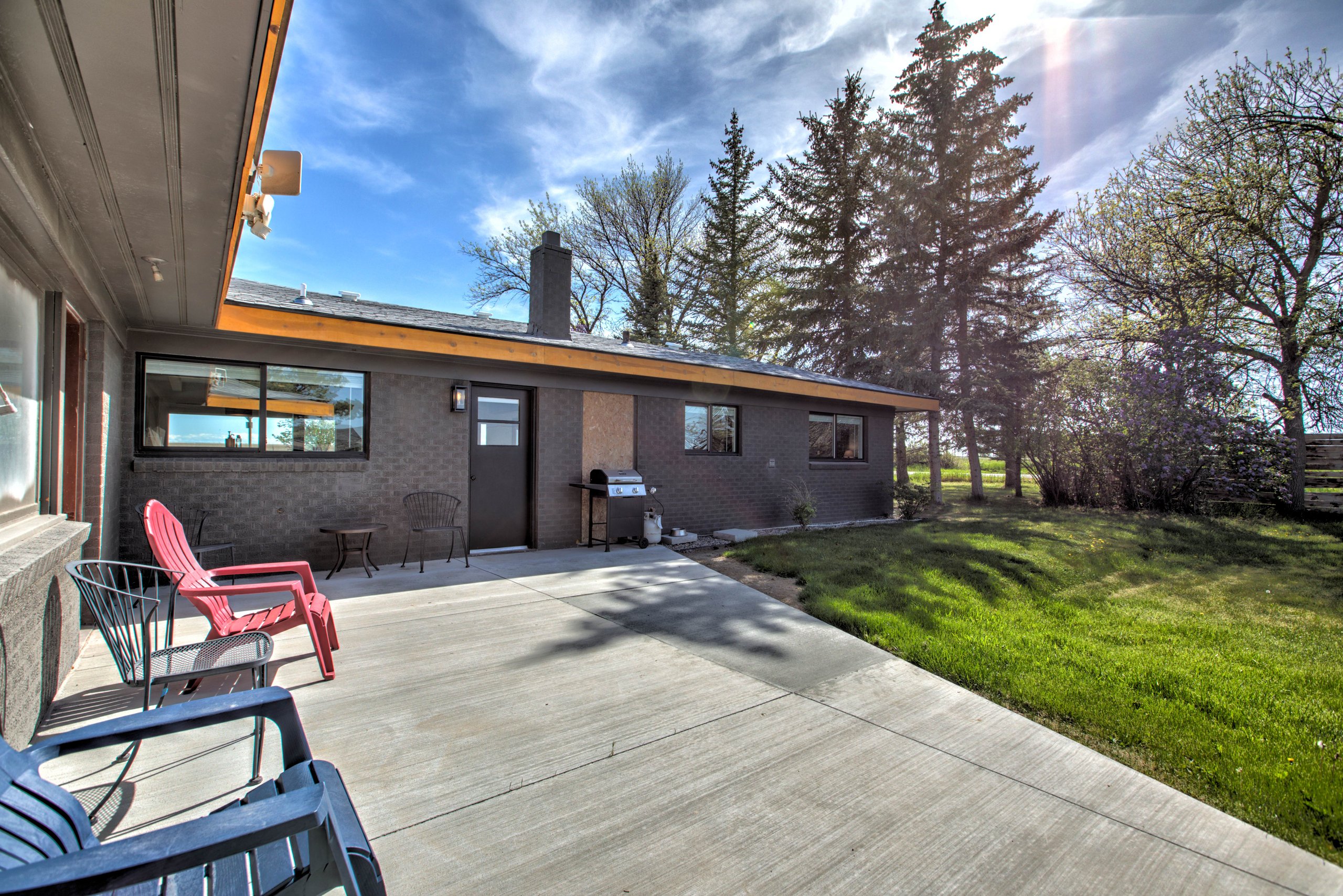 Spacious back patio made for grilling and evenings outdoors