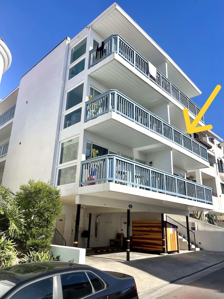 Here is a picture of the exterior of the building. We have added extreme soundproofing so that each suite feels like its own independent villa. Yet, you are right down in the pier bowl steps from the sand.  This condo is on the middle right side