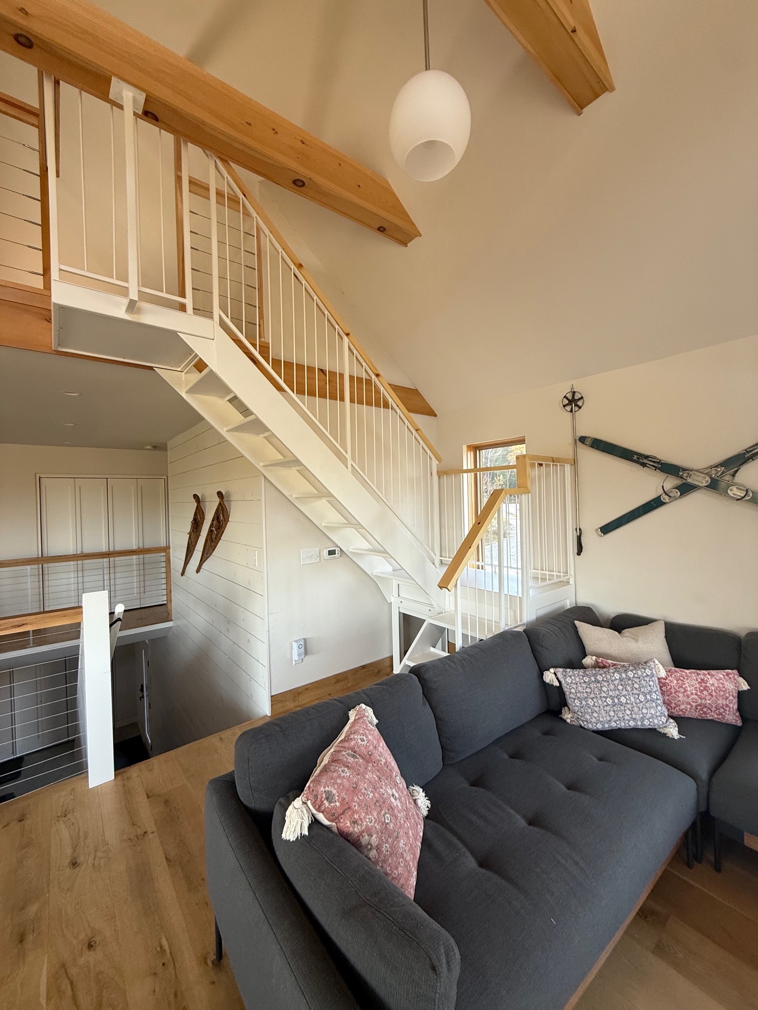 Custom staircase leading to the loft level
