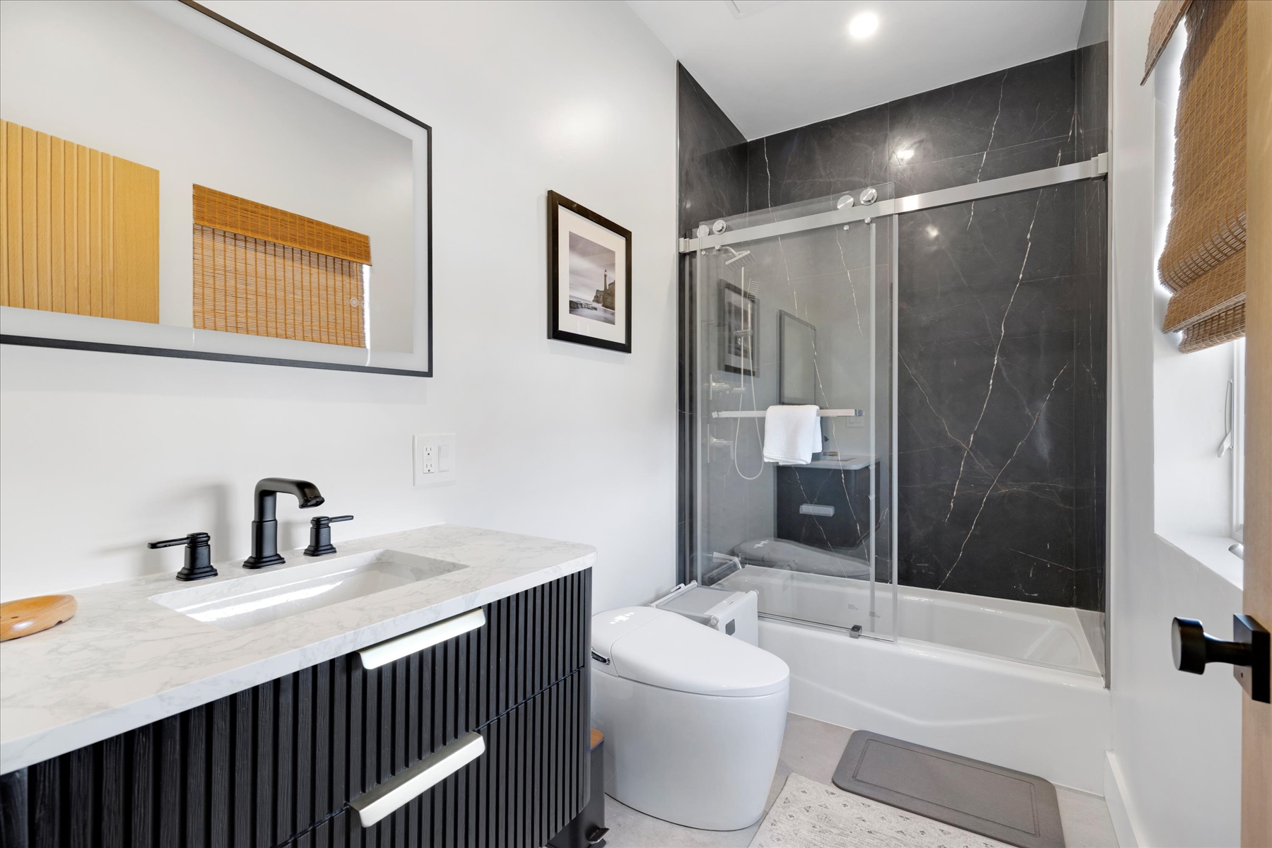 This bathroom has a tub for kids baths if needed. 