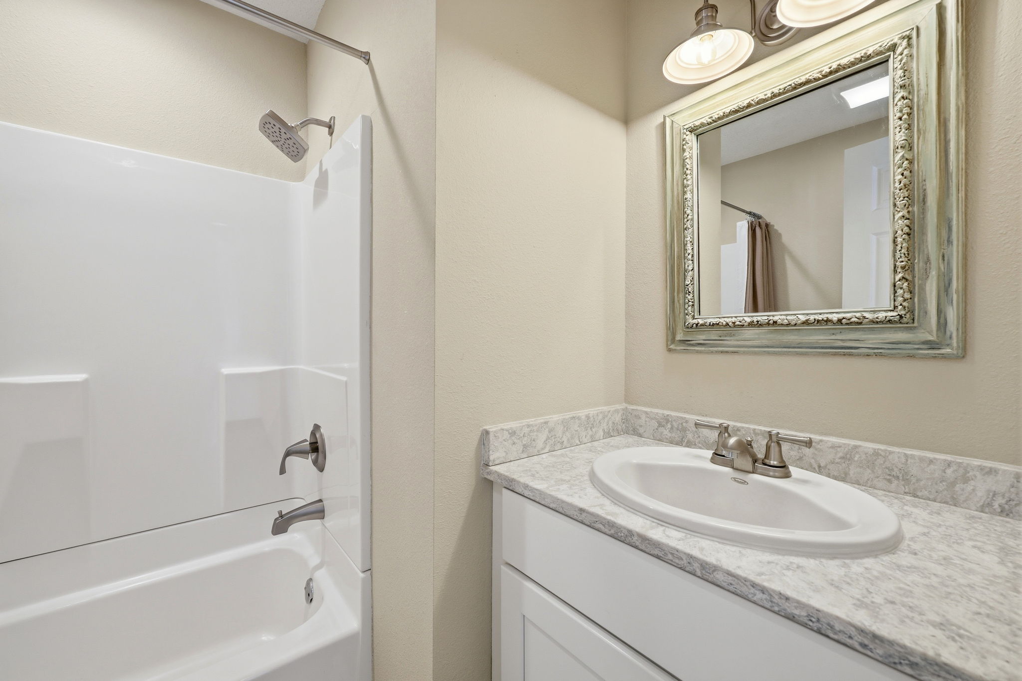 A conveniently located hall bath - perfect for family and friends.