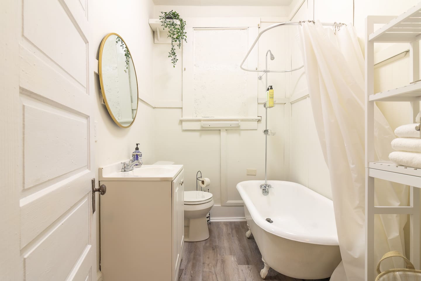 Bathroom with stylish victorian tub and shower. 