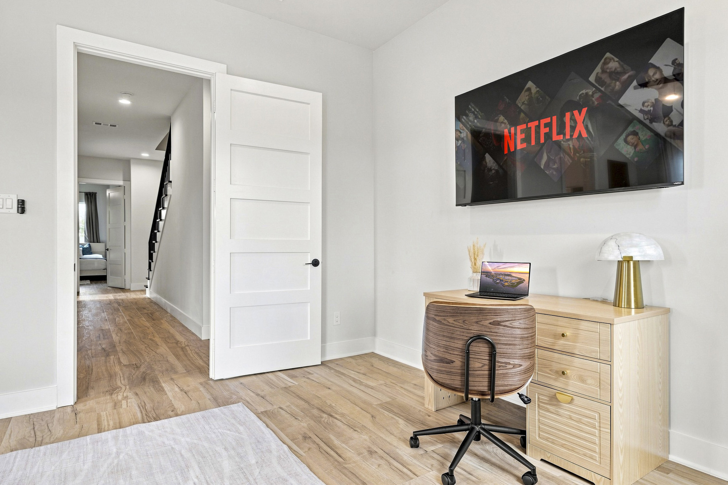 Elevate your work-from-home vibe with stylish decor and a Netflix-ready setup!
