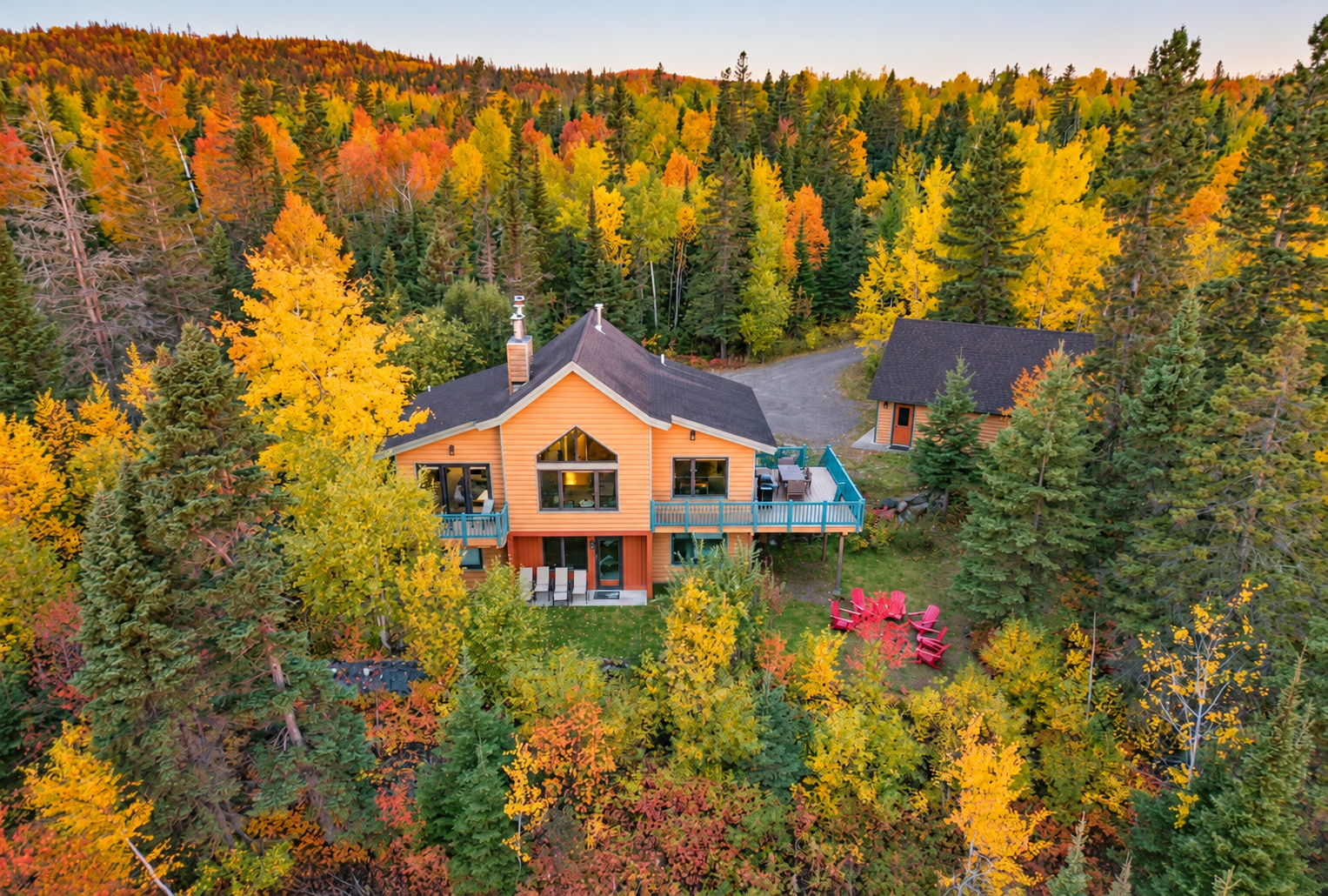 Autumn puts on a show at Treetops in Tofte. Surrounded by colorful North Shore woods, the spacious deck and outdoor fire pit make it easy to enjoy the crisp air and take in the fall scenery.