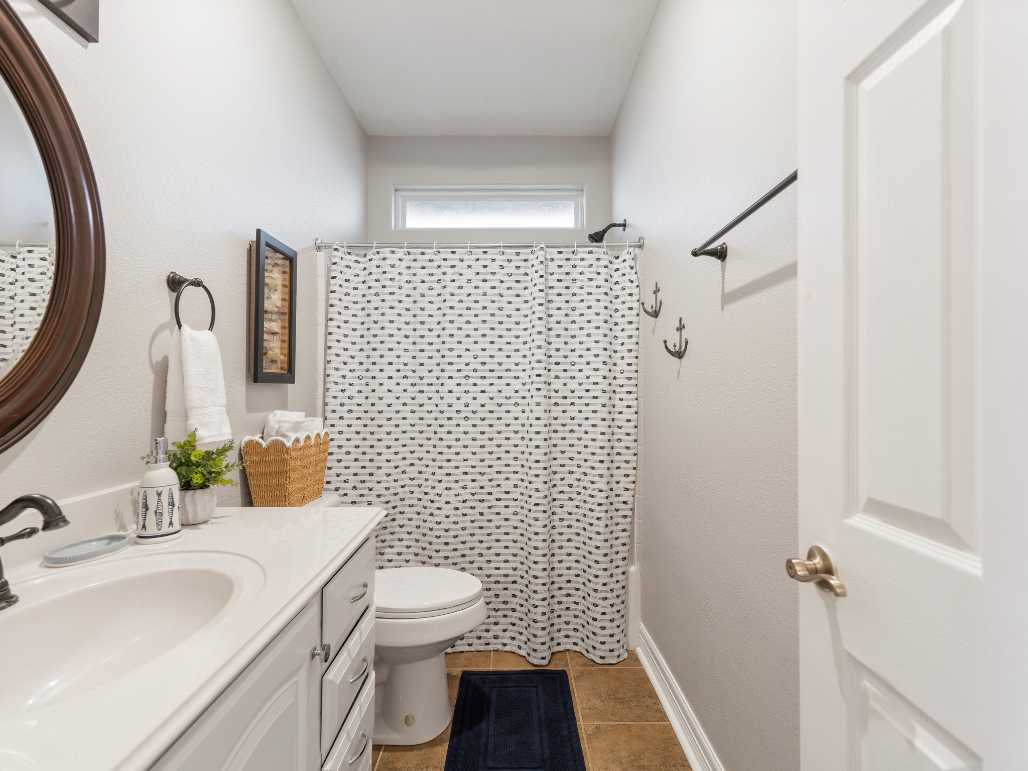 Hall bath on main level of home.