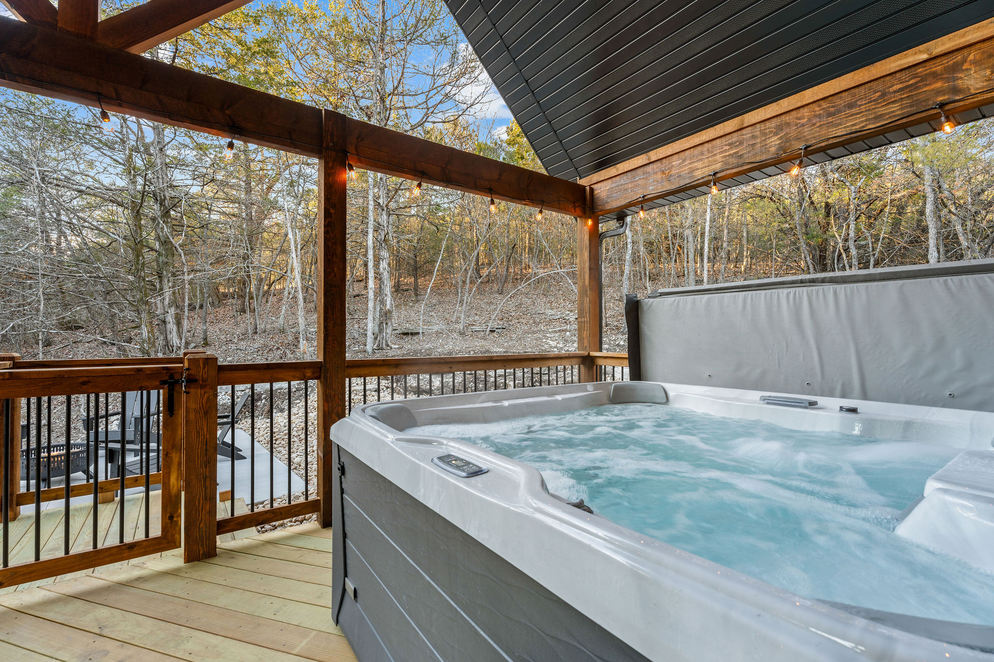 Private hot tub under the covered deck.