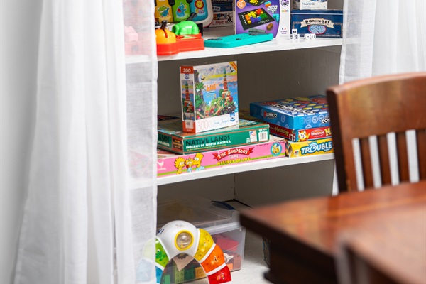 Hours of entertainment with shelves full of games, toys, and books!