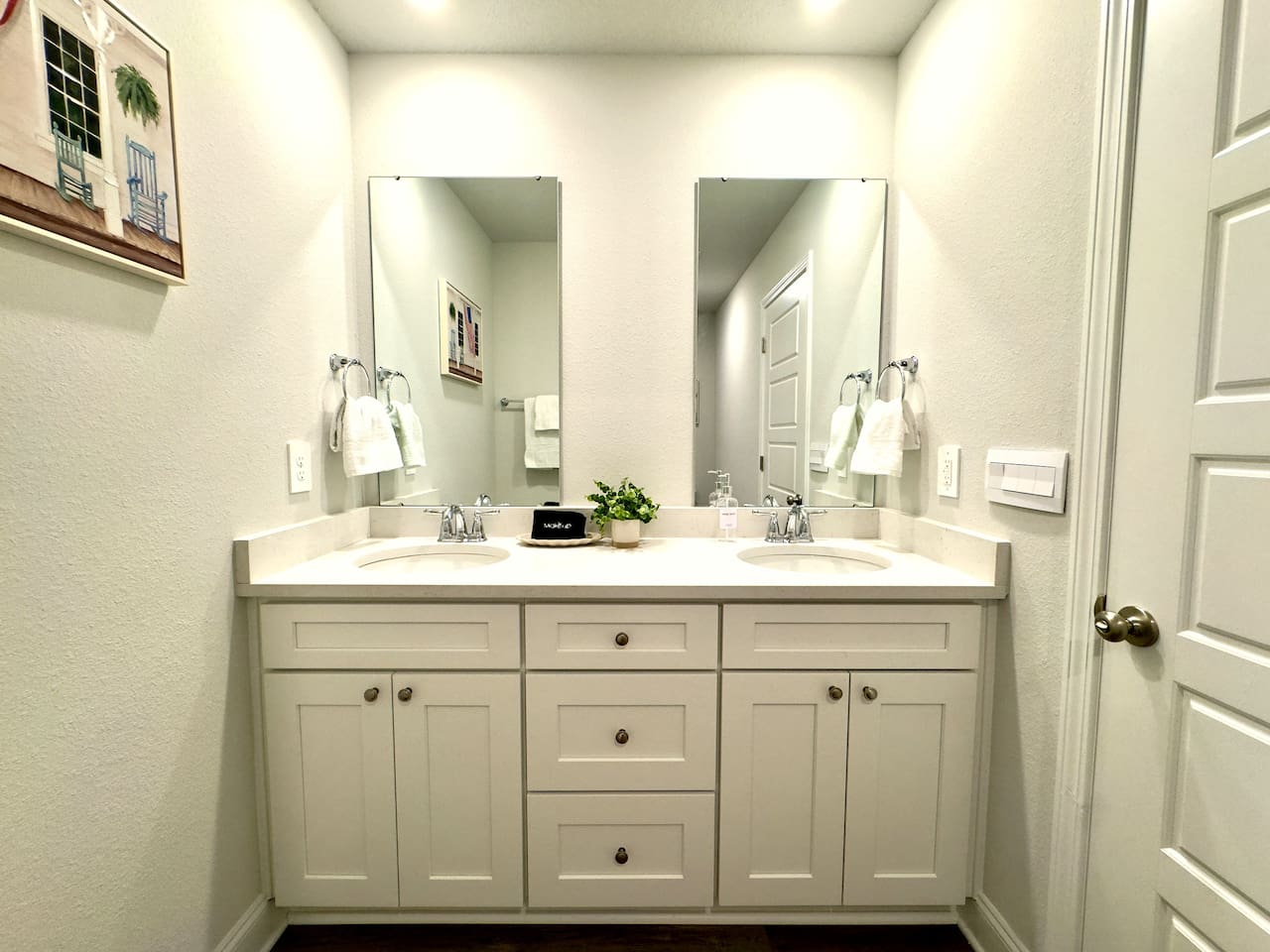 Bright mirror light waking you up. Clean, fresh space to get ready at your own pace.