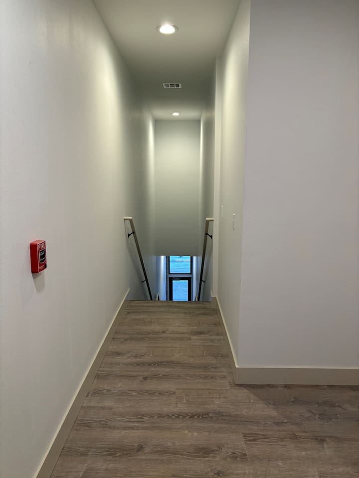 This is the view looking down from atop of the stairs to the Main Street entrance.  We do have approximately 20 stairs to climb that offers a landing in the middle to break up the accent!