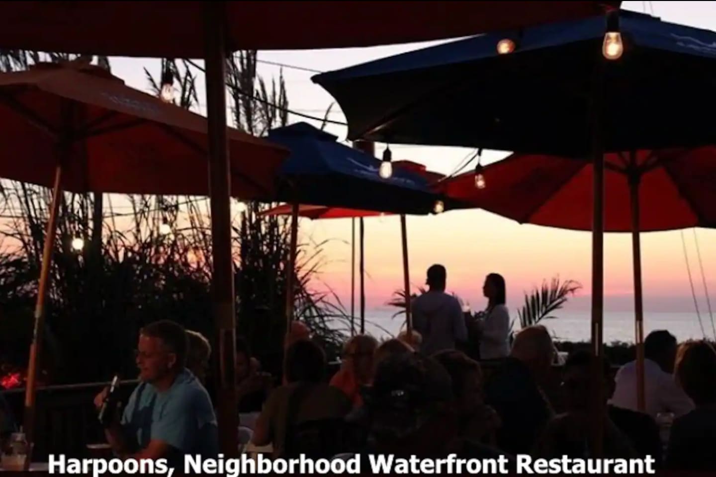 Savor dinner with a view at Harpoons, a popular neighborhood waterfront restaurant. Relax under the glow of string lights and umbrellas while watching a spectacular sunset over the water at this local favorite.