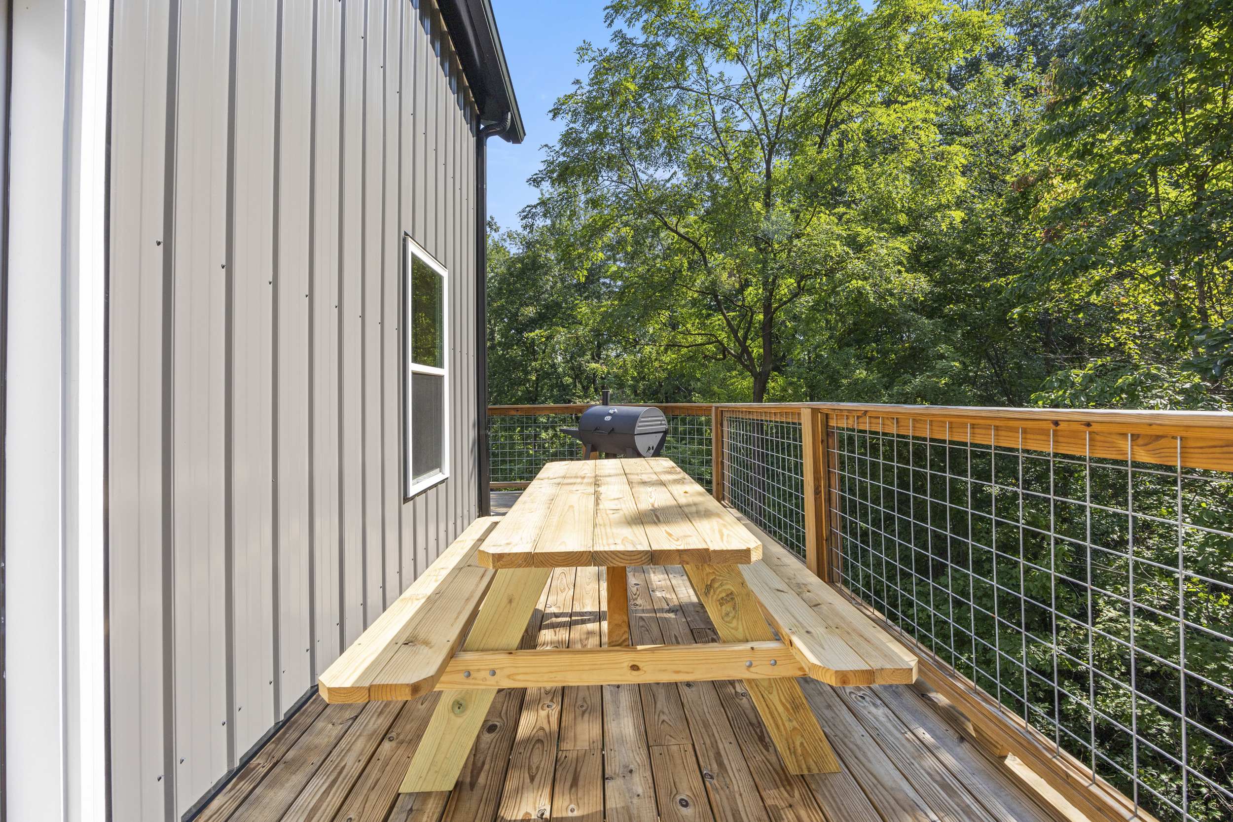 Picnic table on the deck — a great spot for outdoor meals or morning coffee.