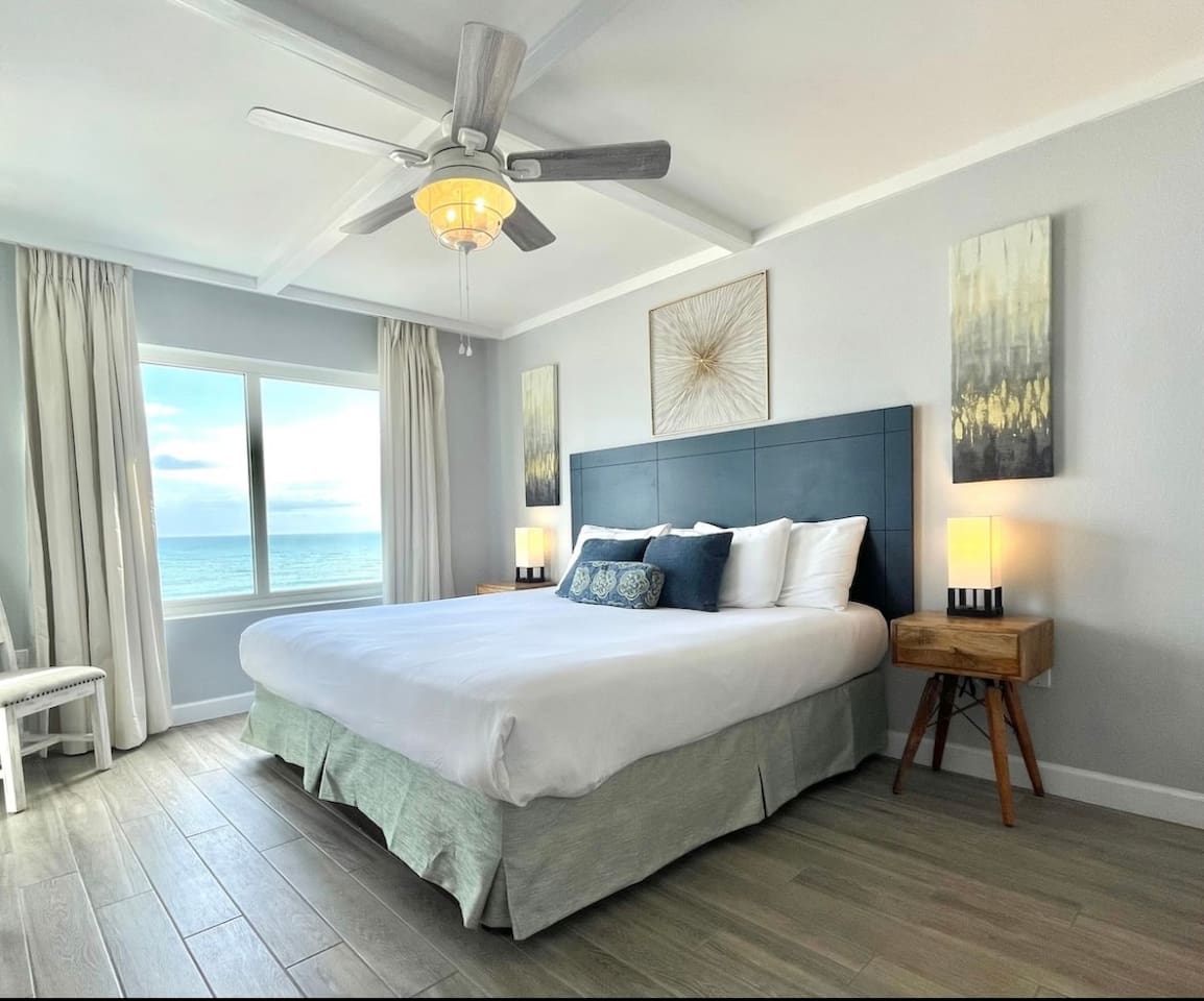Master King Bed. Ocean View with balcony access and private bathroom attached. 