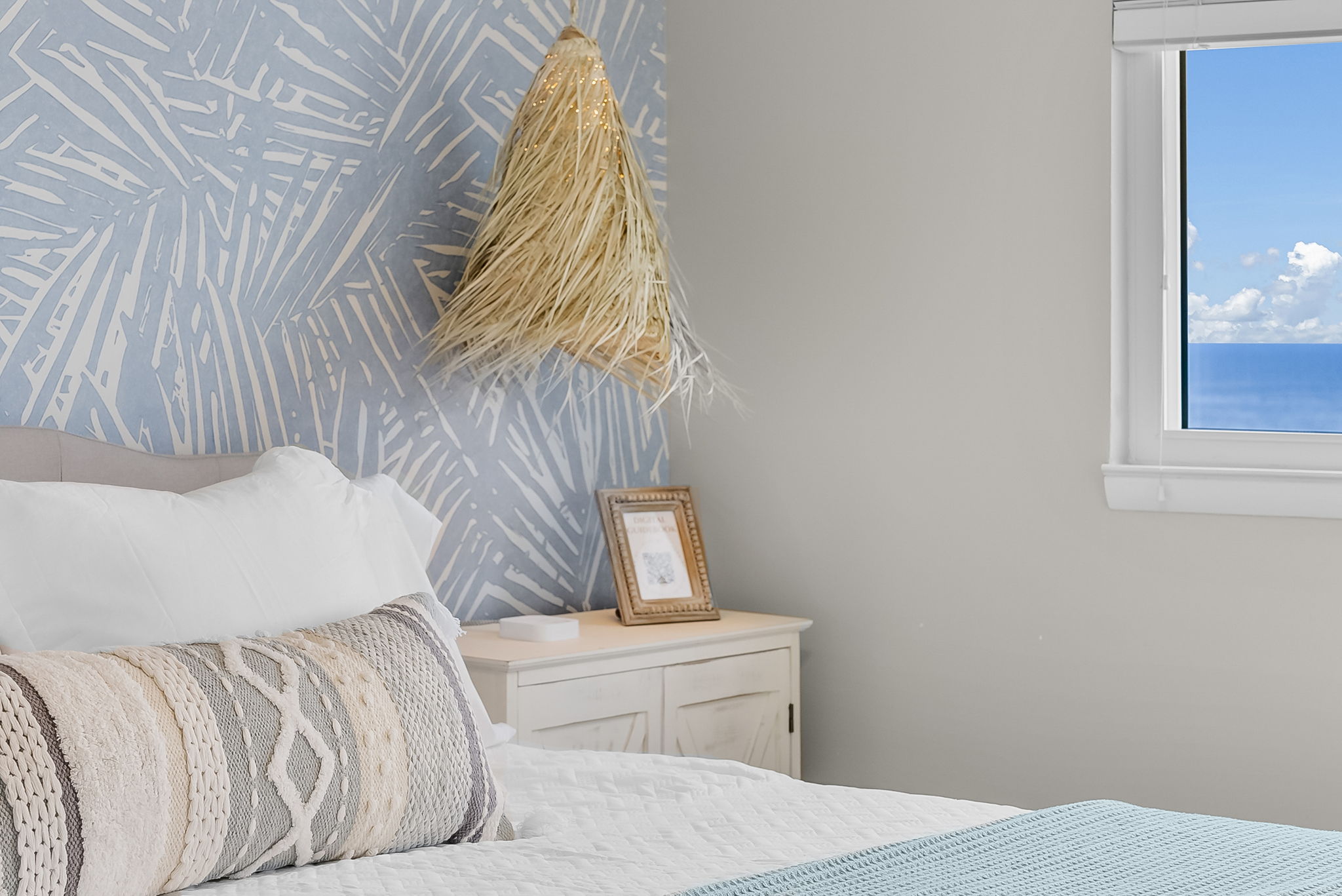 Master bedroom has sliding glass doors that go out onto the private balcony with stunning ocean views for miles and miles.