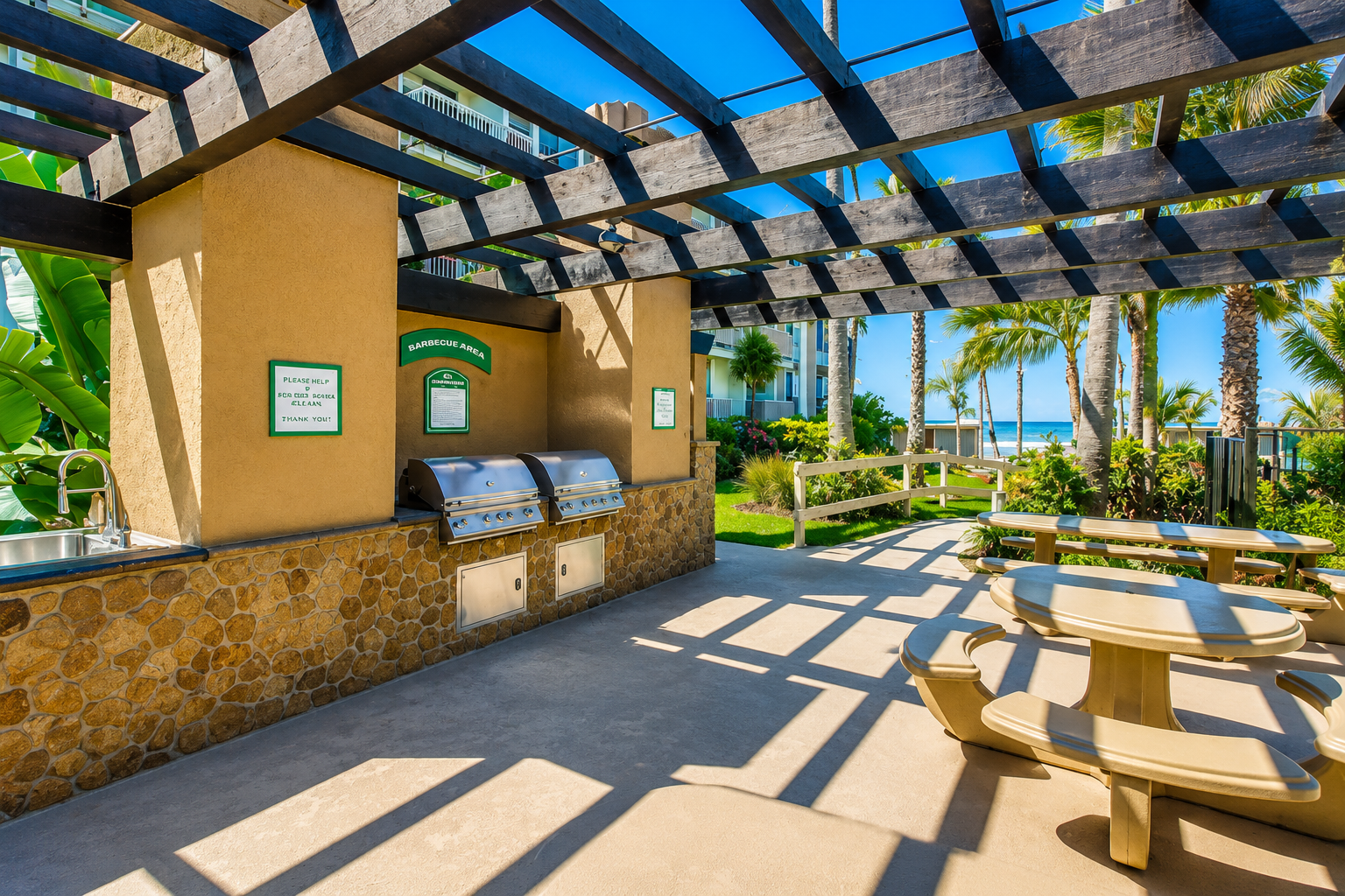 Community barbecue area overlooking the pool