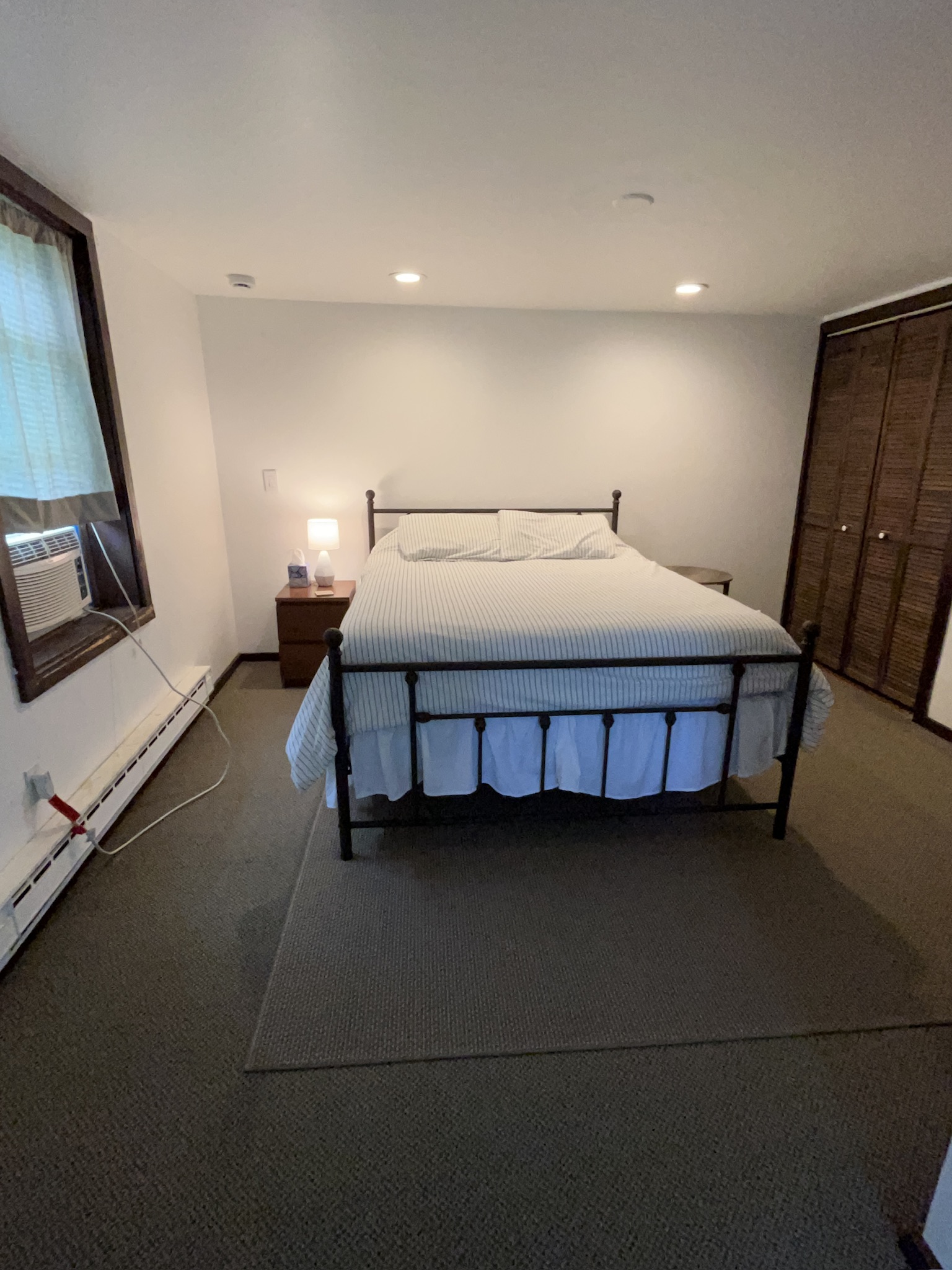 Queen bed in barn one bedroom apartment 