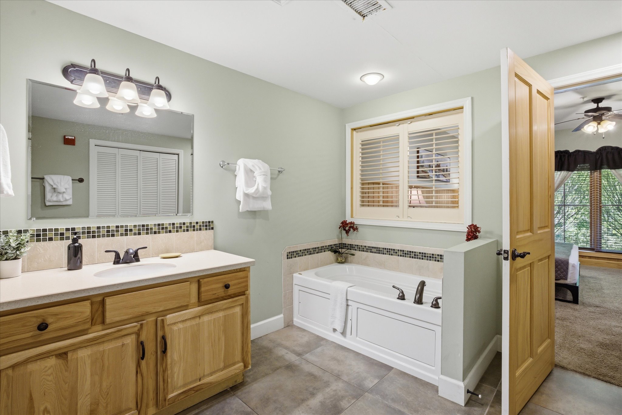 Soak, refresh, and take your time in the master bathroom with a deep soaking tub, double sinks, and a walk-in shower—plenty of space to unwind and get ready without feeling rushed.