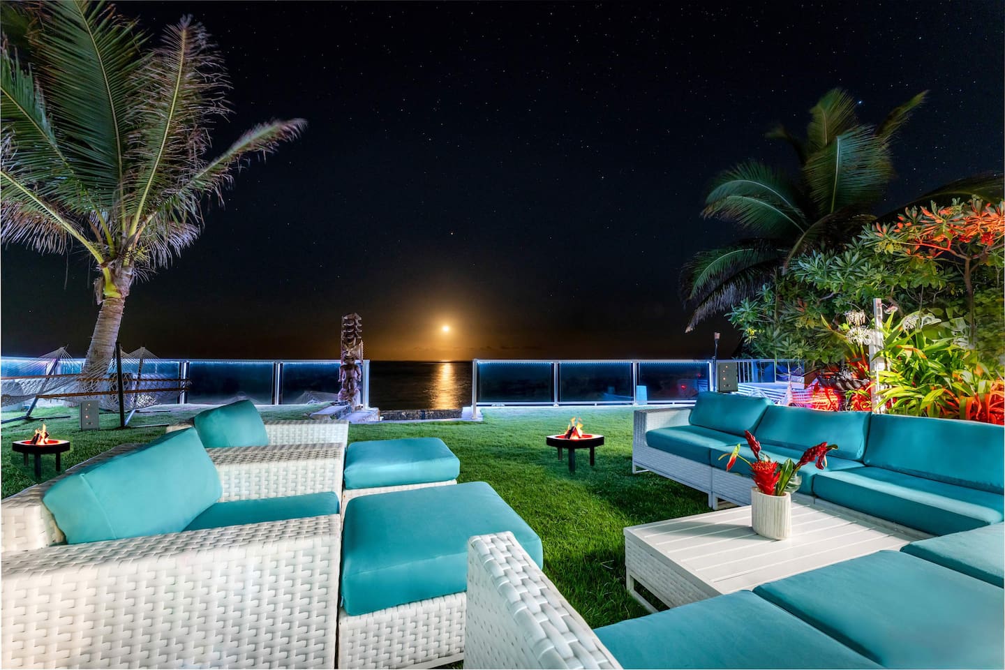 Ethereal moonrise right at the horizon with endless ocean acres and tons of stars in the sky. JBL outdoor tower speakers in home's beachfront garden and enclosed private beach with steps leading to a waist-deep, crystal clear snorkeling coral reef.