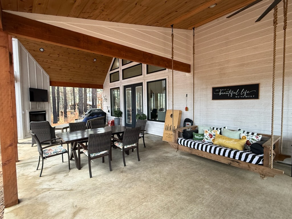 Spacious covered patio perfect for outdoor dining and gatherings.