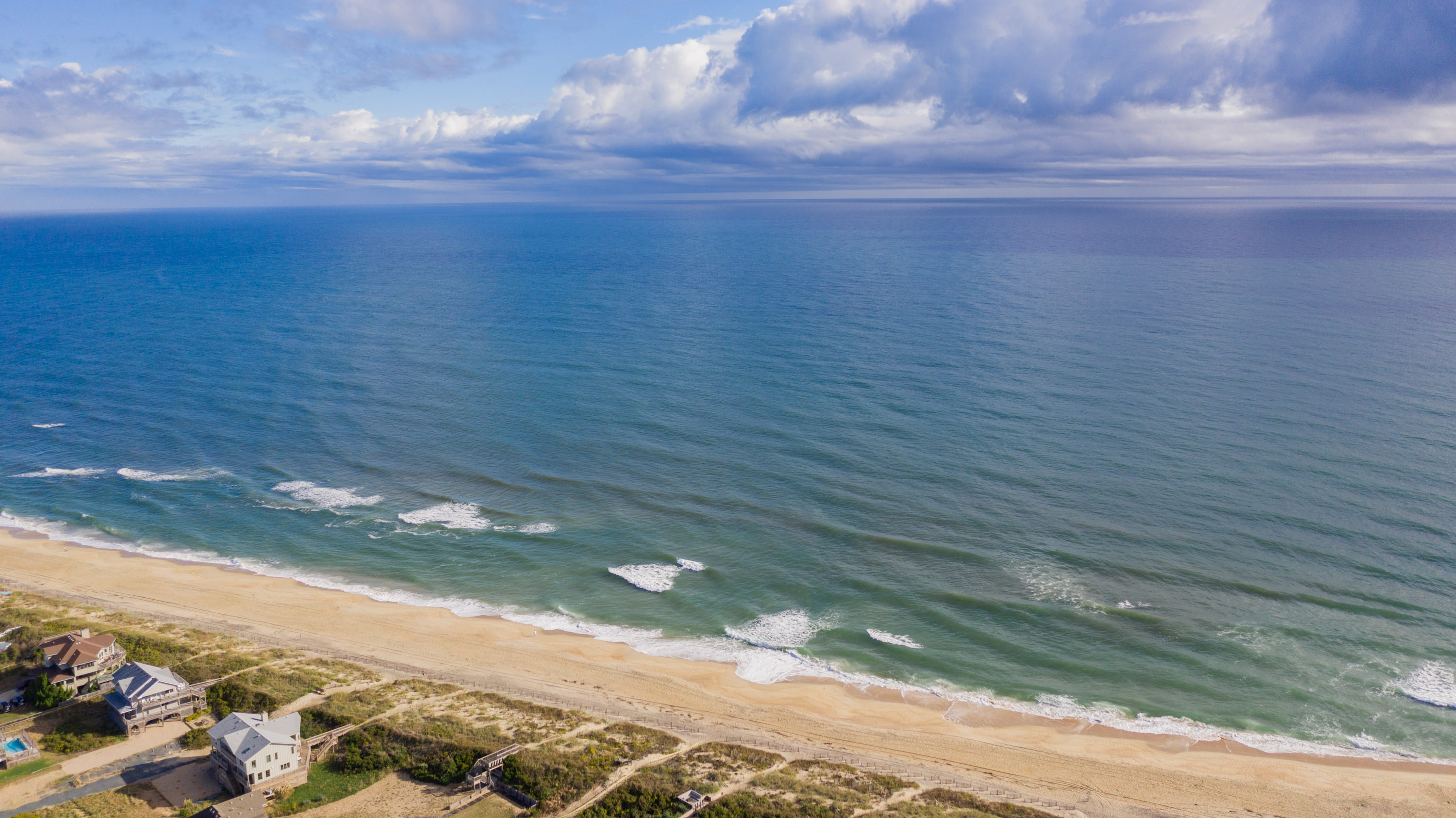 Beautiful beaches await, just a three minute stroll down the road.  Grab your gear and let’s go!