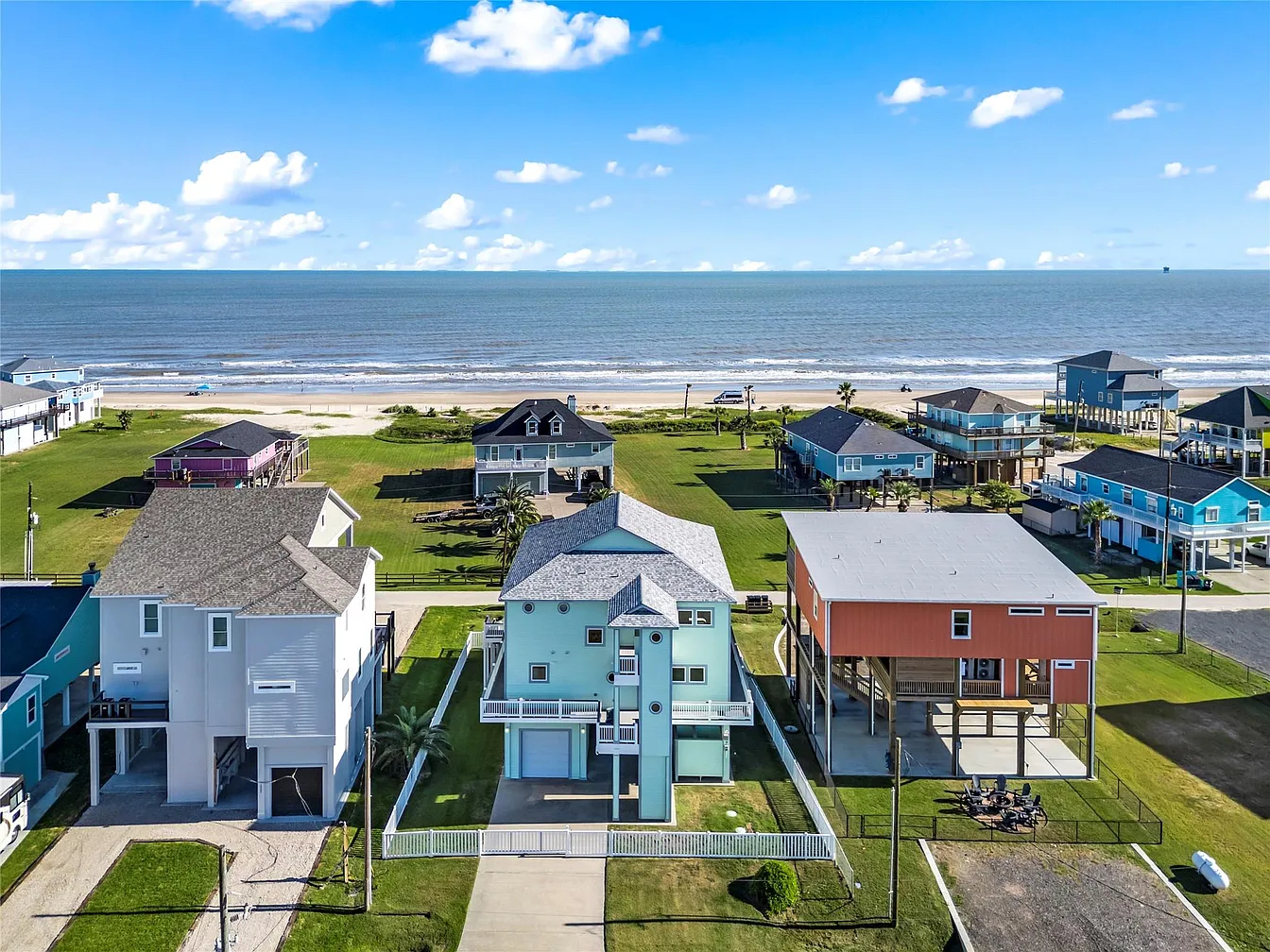 Crystal Paradise Exterior: Welcome to your coastal escape, this is the home and ocean scenery that will set the tone for your entire stay.