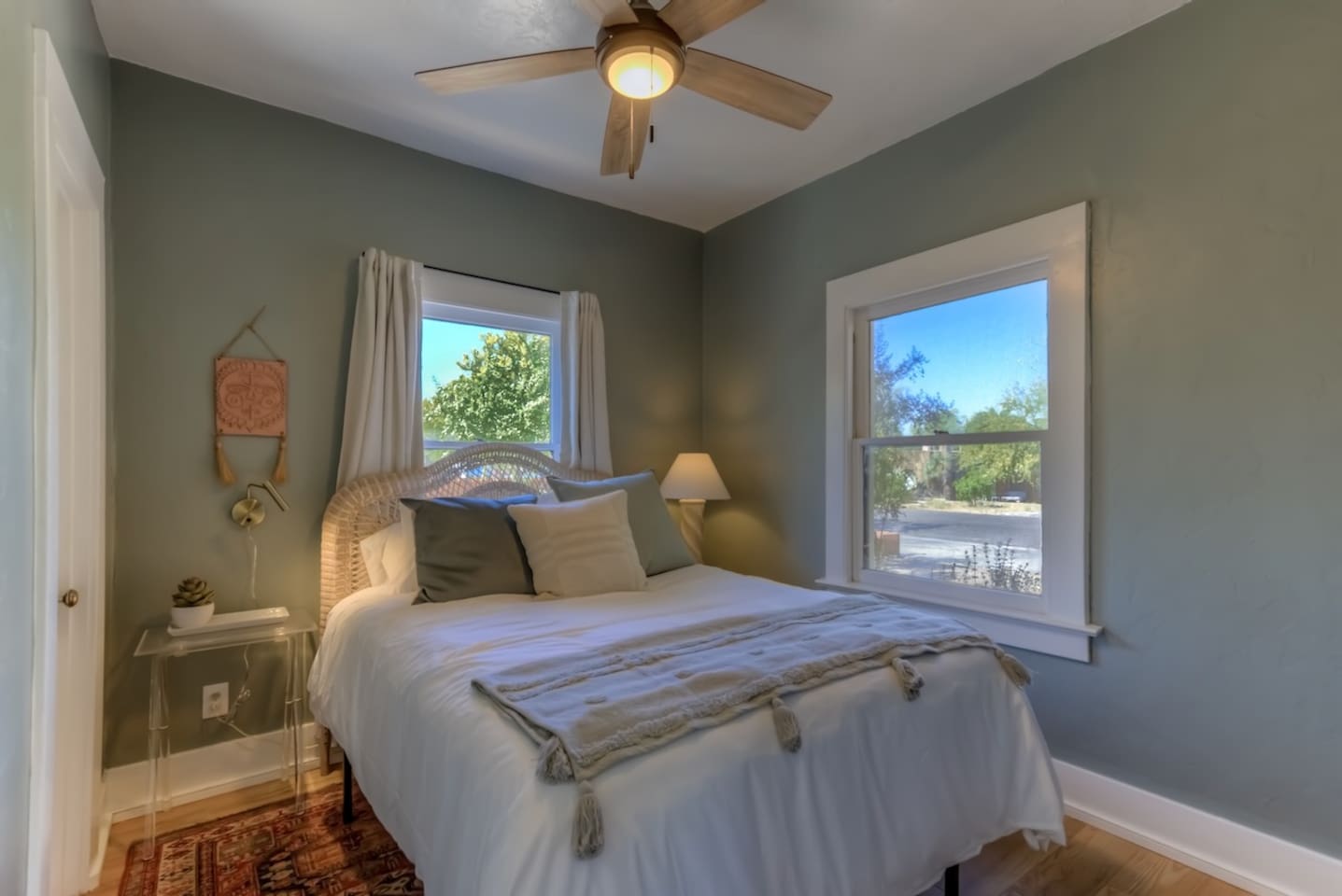 front bedroom with reading lights and closet