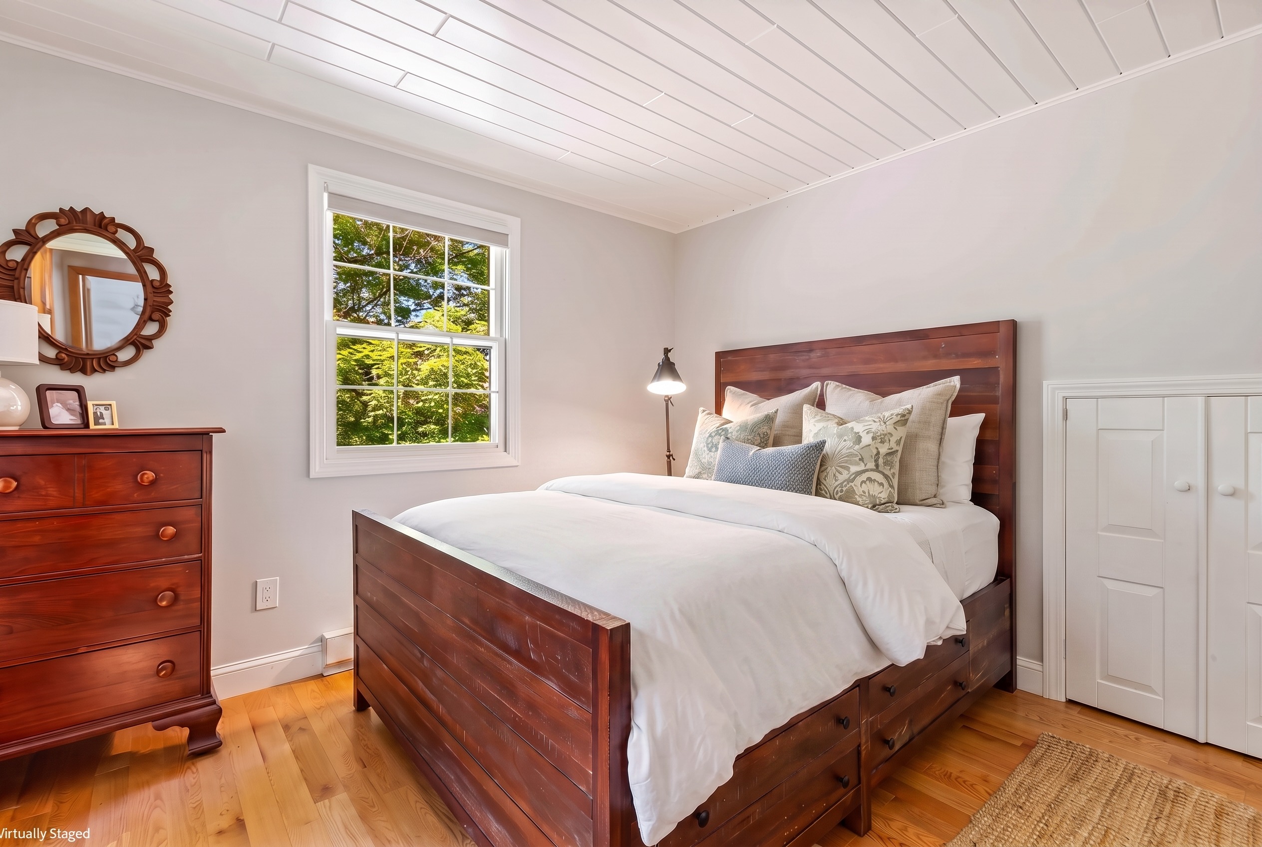 Upstairs bedroom with Queen Bed and View towards Kezar Lake. 