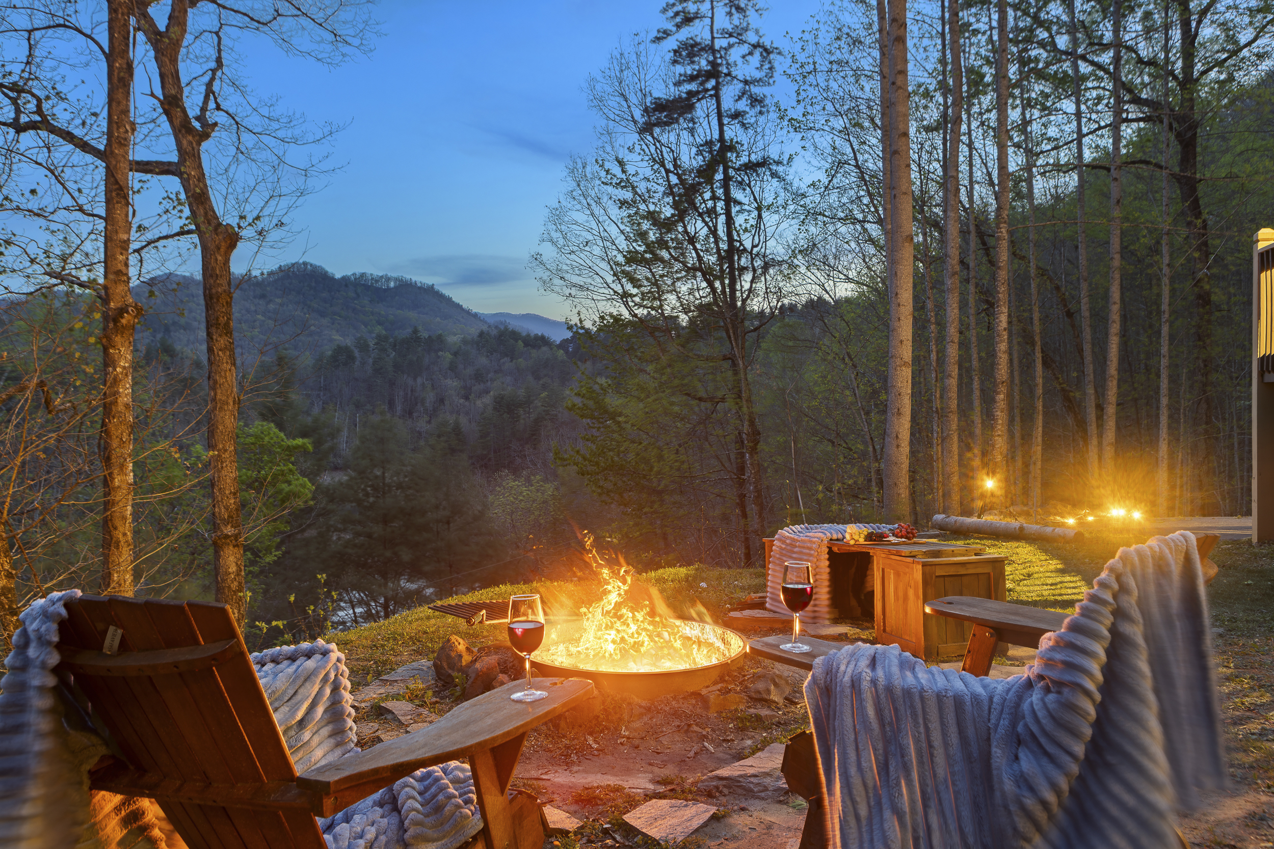 Fire Pit Retreat: Unwind under the stars with drinks and a crackling fire amidst nature's beauty!