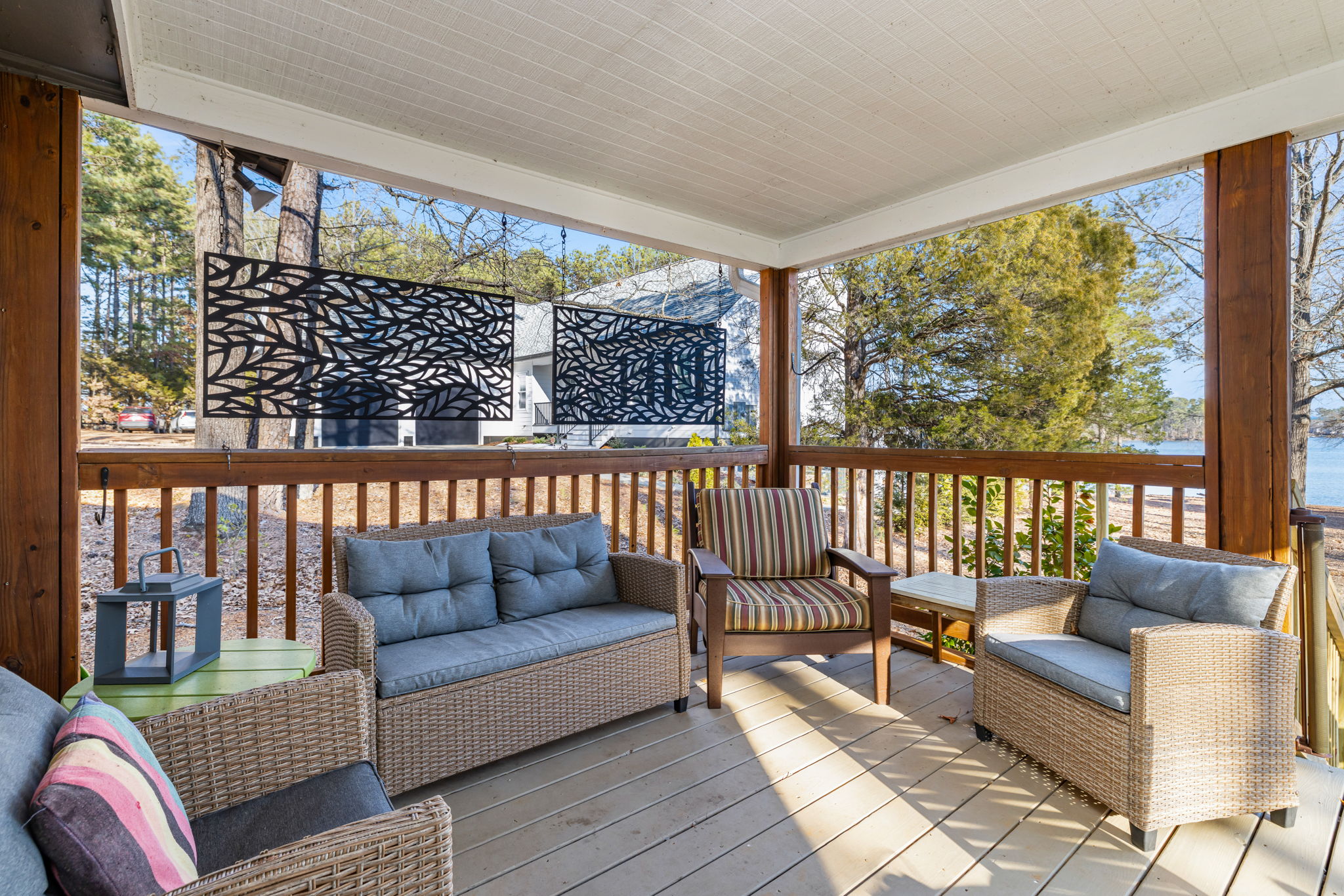 Porch: Sip your morning coffee amid tranquil views and stylish seating!